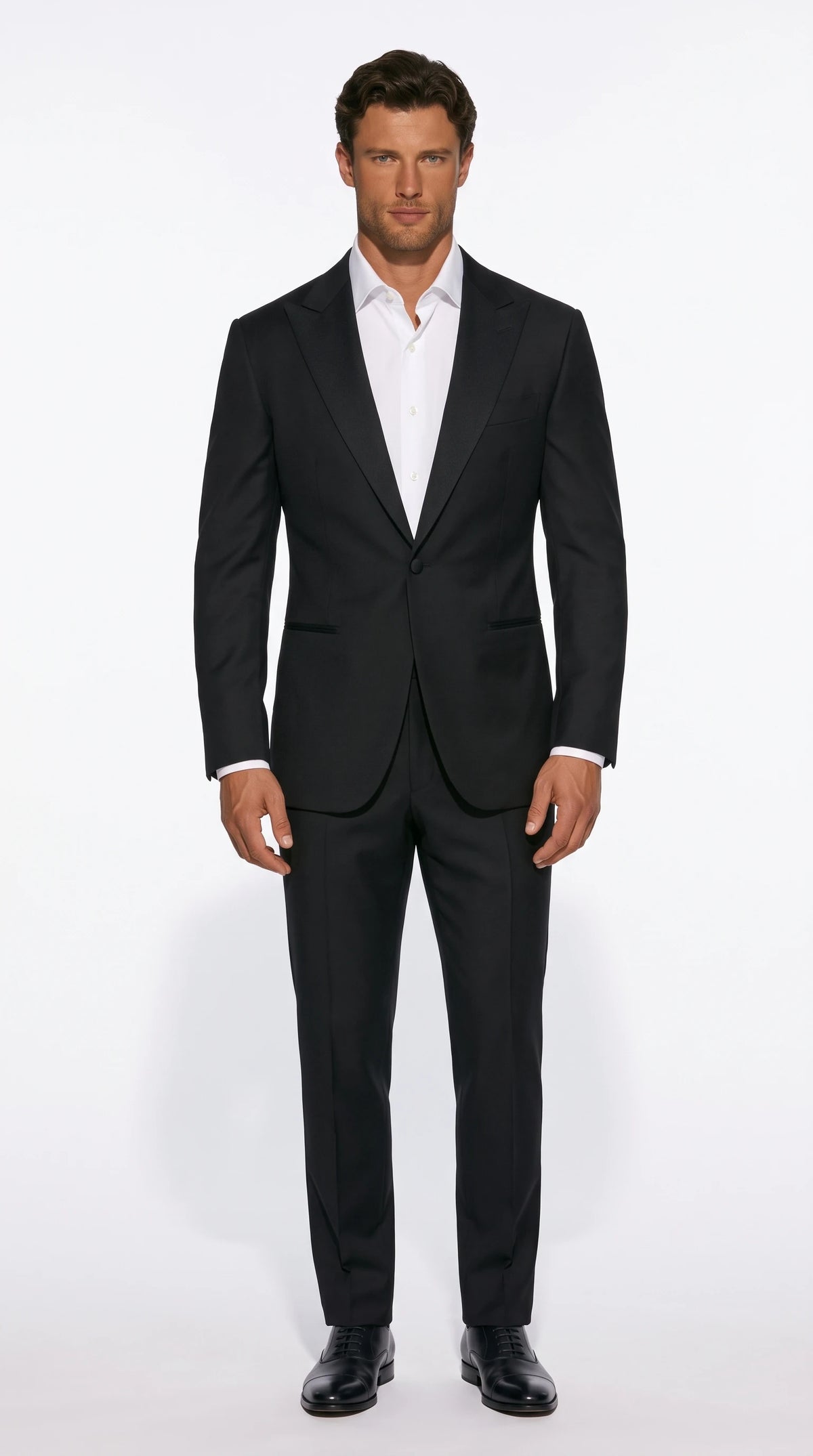 Christopher Noir Single-Button Suit in black with a peak lapel and deep open V