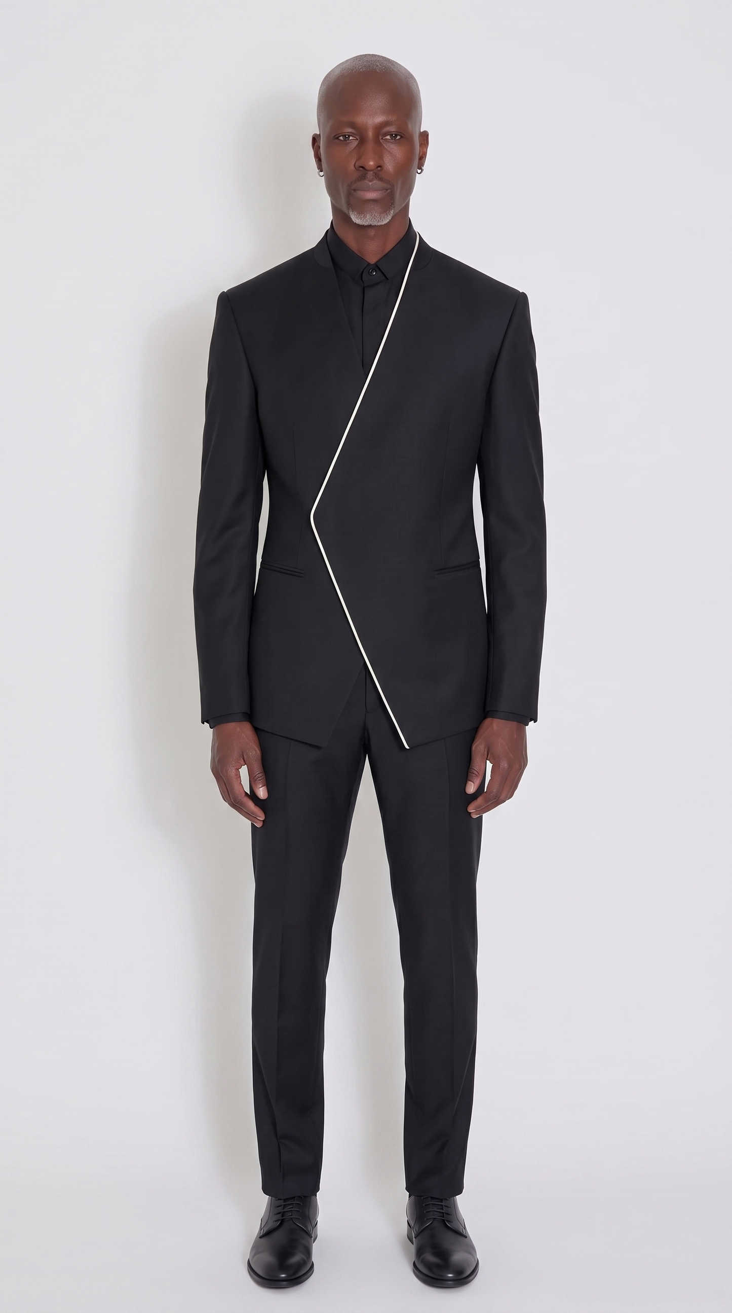 The Noir Blade Suit — jet black collarless diagonal closure suit