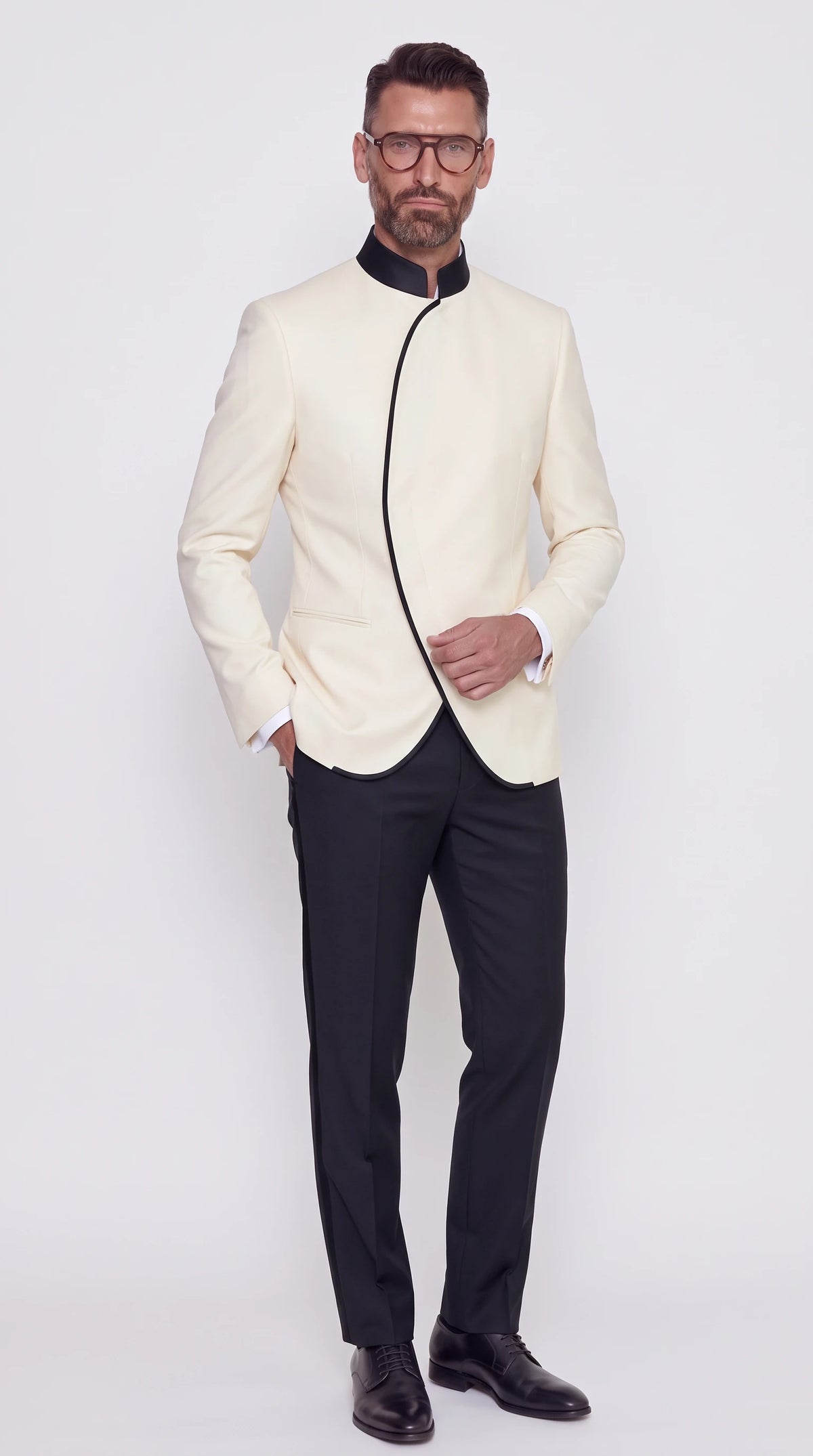 The Noir Crescent Faille Suit — Cream & Black Contrast Suit — front view, cream jacket with black collar and piped curved front, black trousers, Christopher Noir