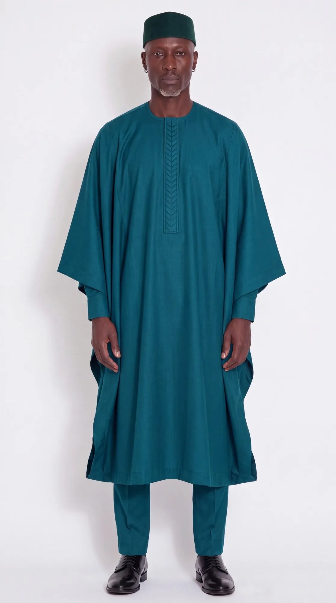 Noir Peacock Agbada — deep teal men's agbada set, worn on model