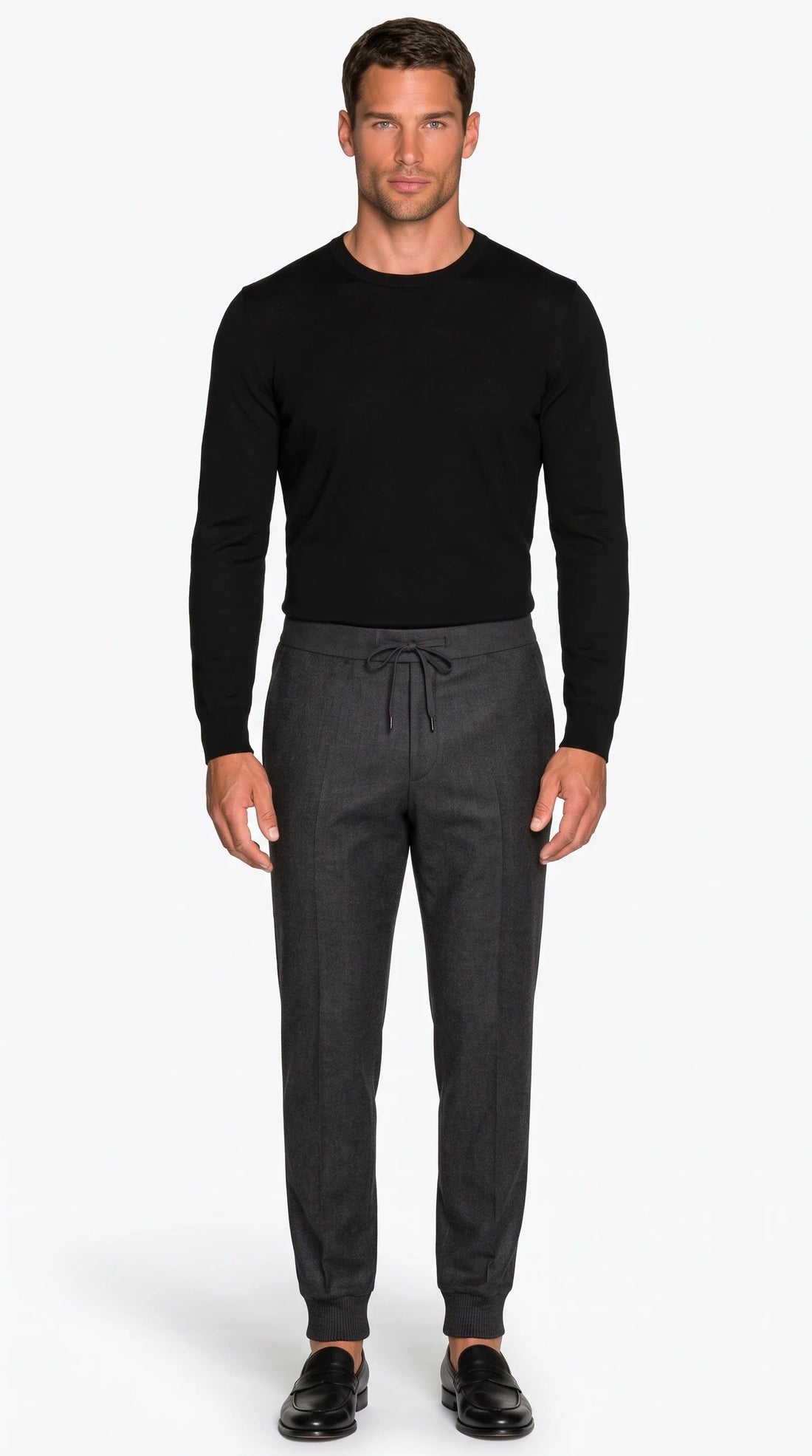 The Noir Whitstable charcoal wool tailored jogger with pressed creases and ribbed cuffs