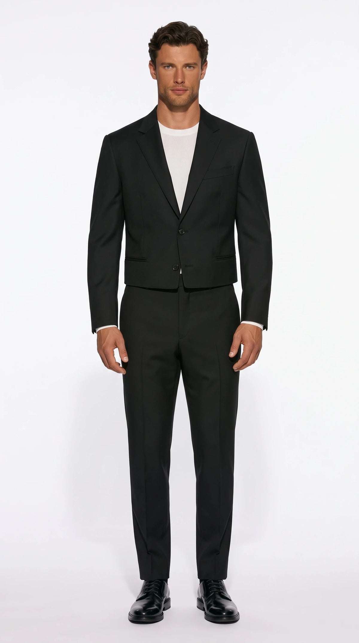 Christopher Noir Cropped-Jacket Suit in black, shown with a cropped two-button jacket and tailored trousers
