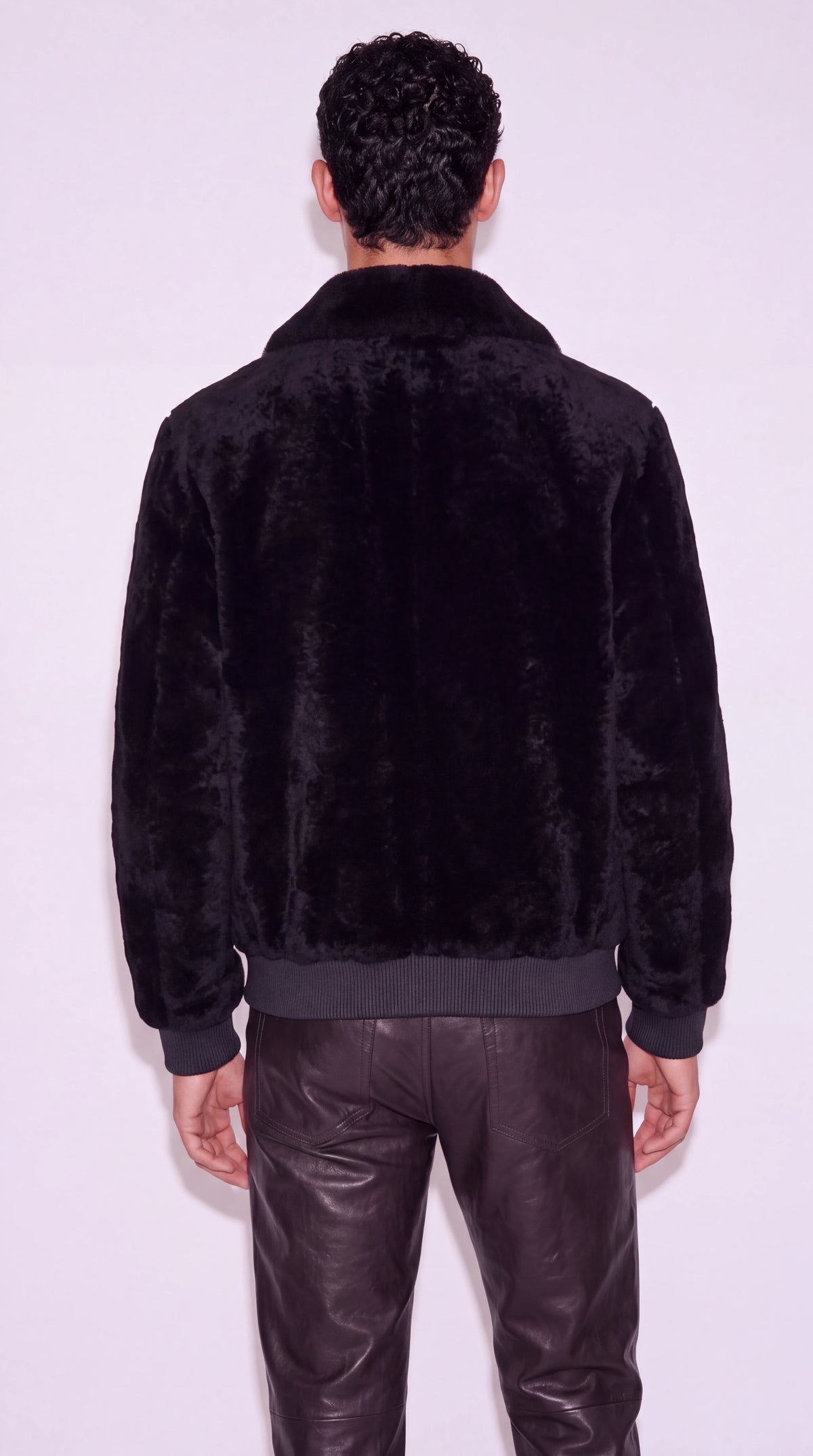 The Noir Greenwich black shearling bomber jacket by Christopher Noir, back view
