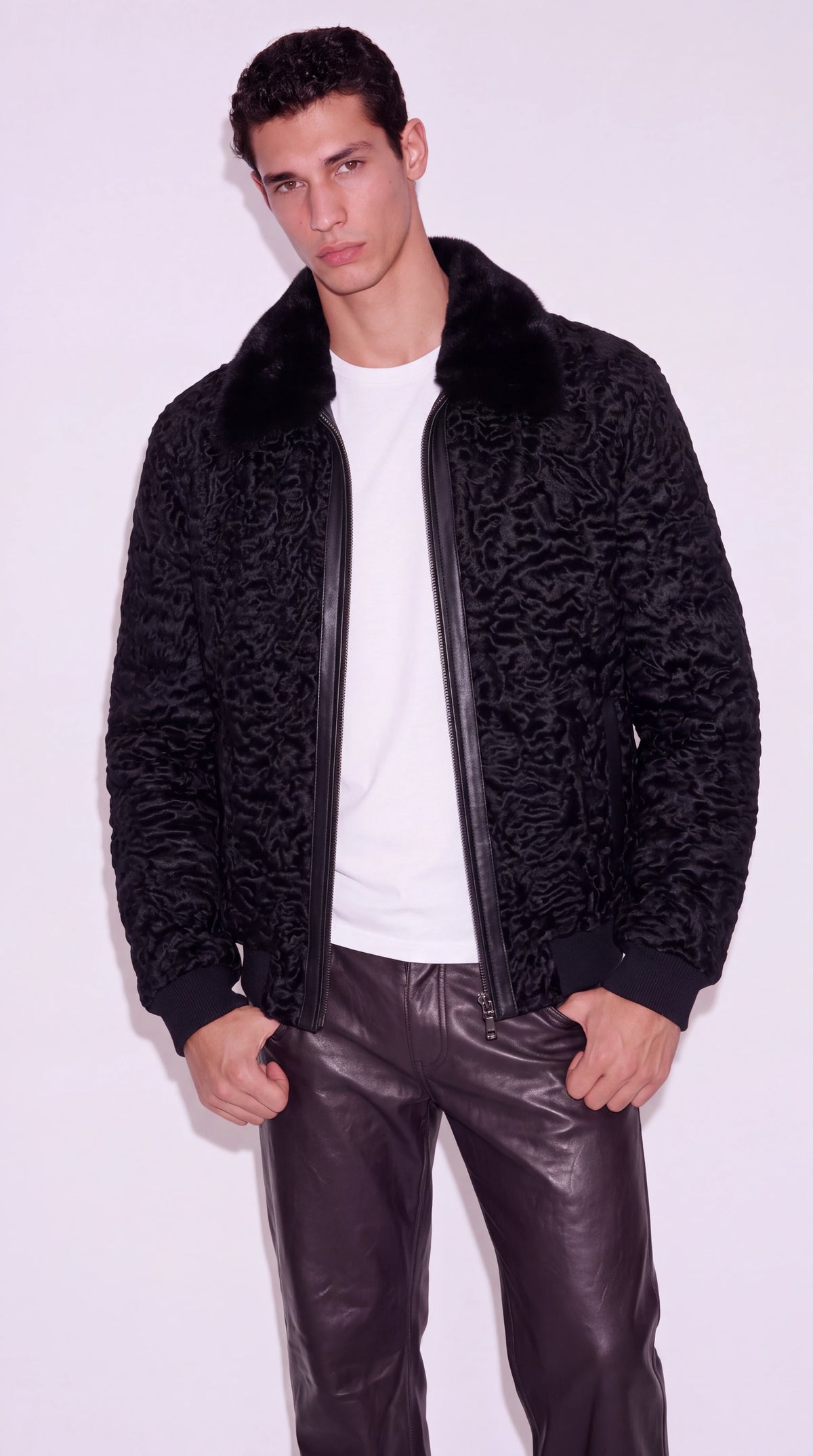 The Noir Westminster black astrakhan bomber jacket by Christopher Noir, front view