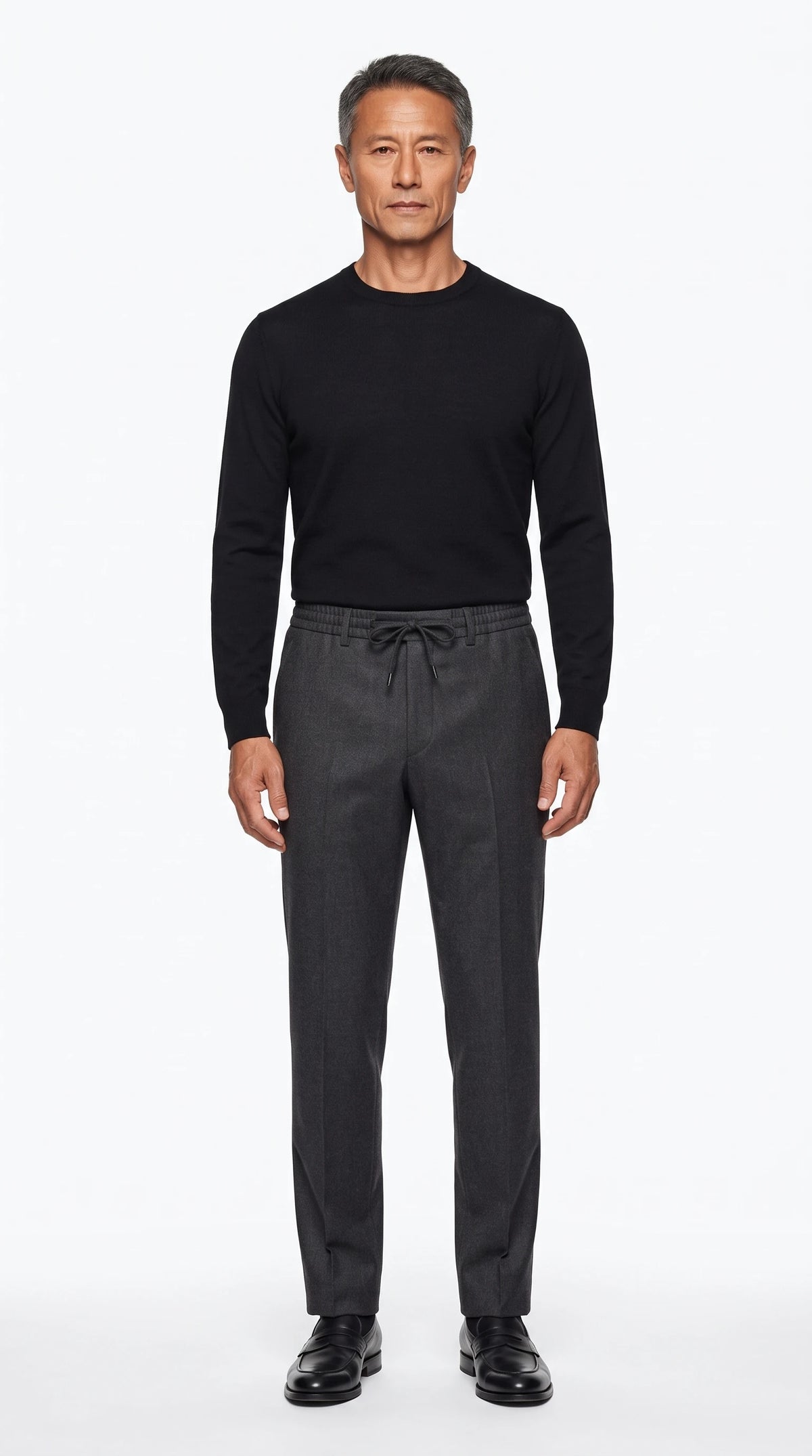 The Noir Minchinhampton charcoal wool drawstring trousers by Christopher Noir