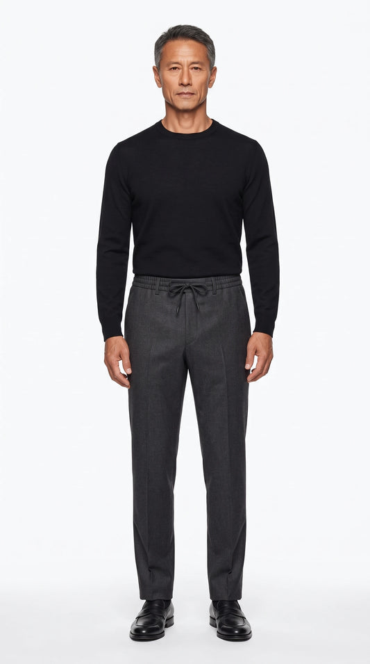 The Noir Minchinhampton charcoal wool drawstring trousers by Christopher Noir