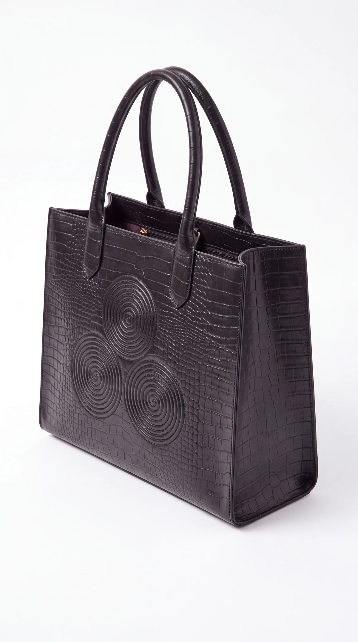 Christopher Noir Ashbourne black croc-embossed tote, angled view with interior zip compartment visible