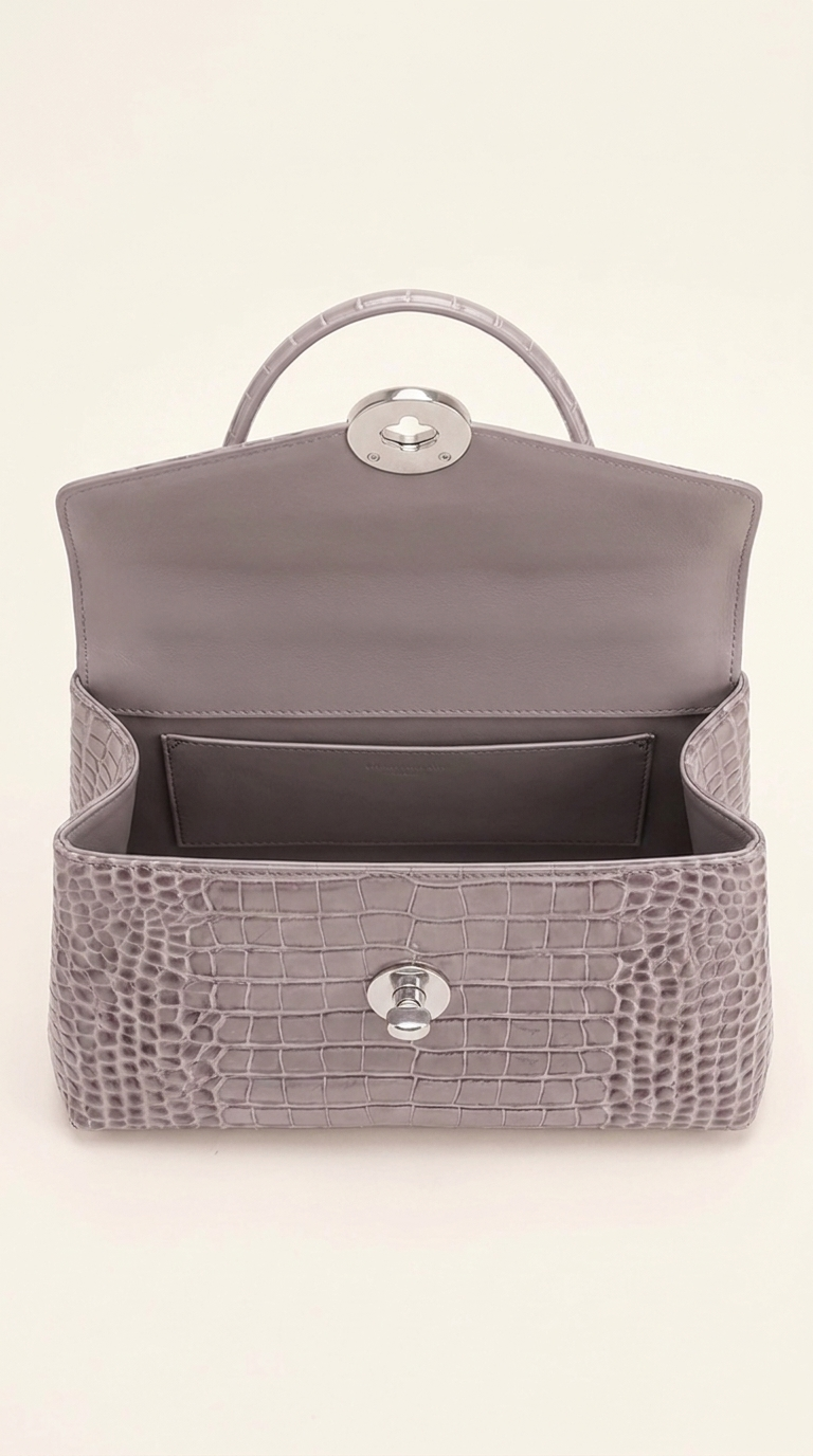 Kelvedon handbag in dove grey, open interior showing slip pocket