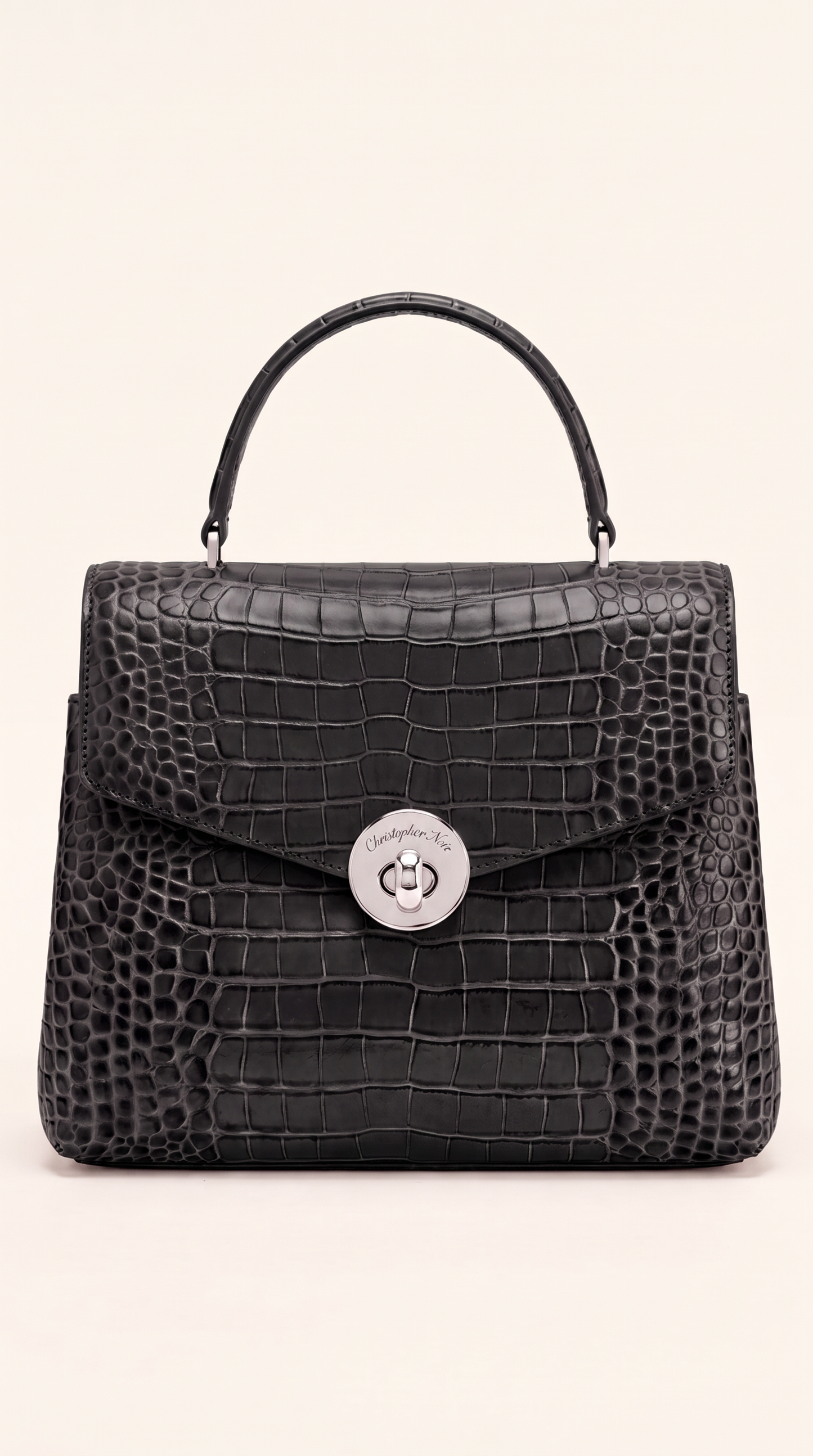 Kelvedon croc-embossed leather top-handle handbag in jet black, front view