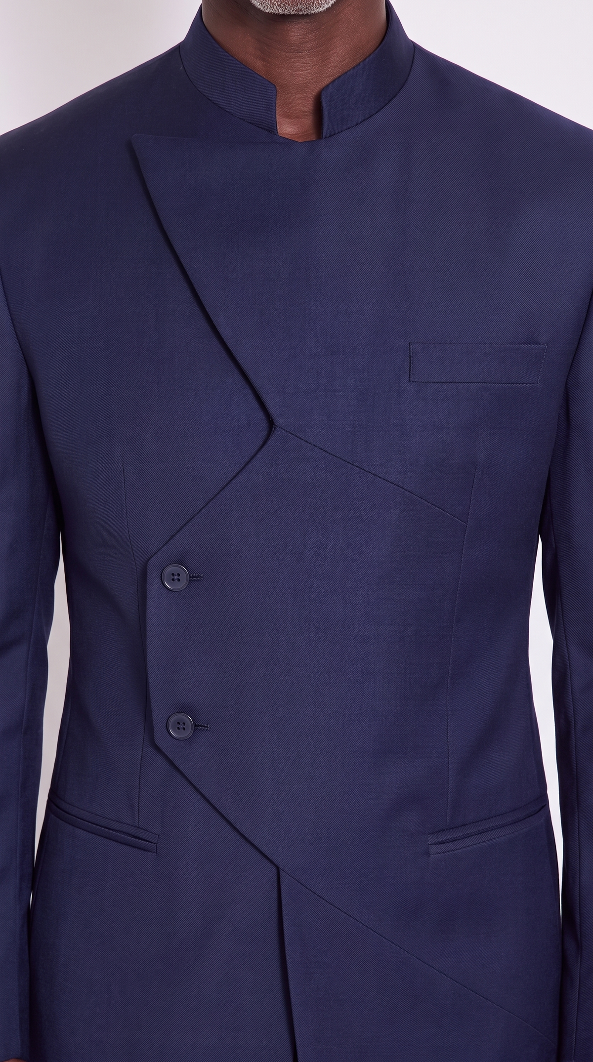 The Noir Meridian Suit — Navy Angular-Panel Suit – mandarin collar, angular overlap panel and two-button fastening close-up, Christopher Noir
