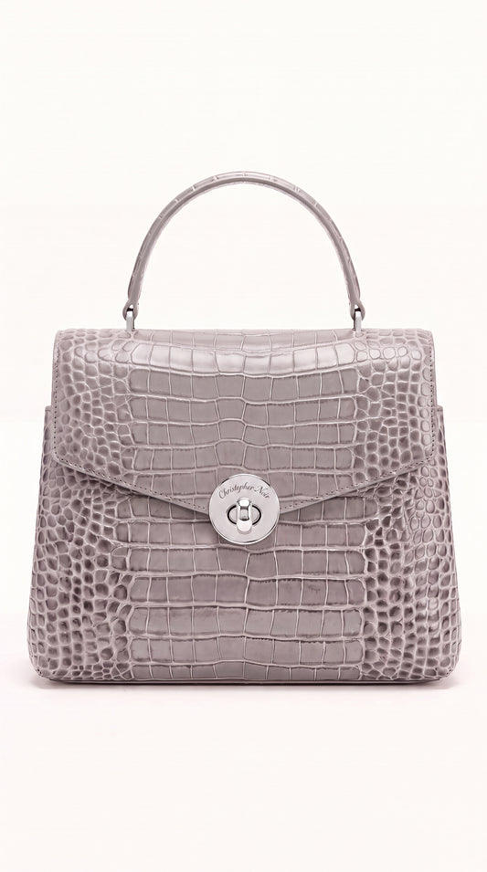 The Noir Kelvedon croc-embossed leather handbag in dove grey, front view