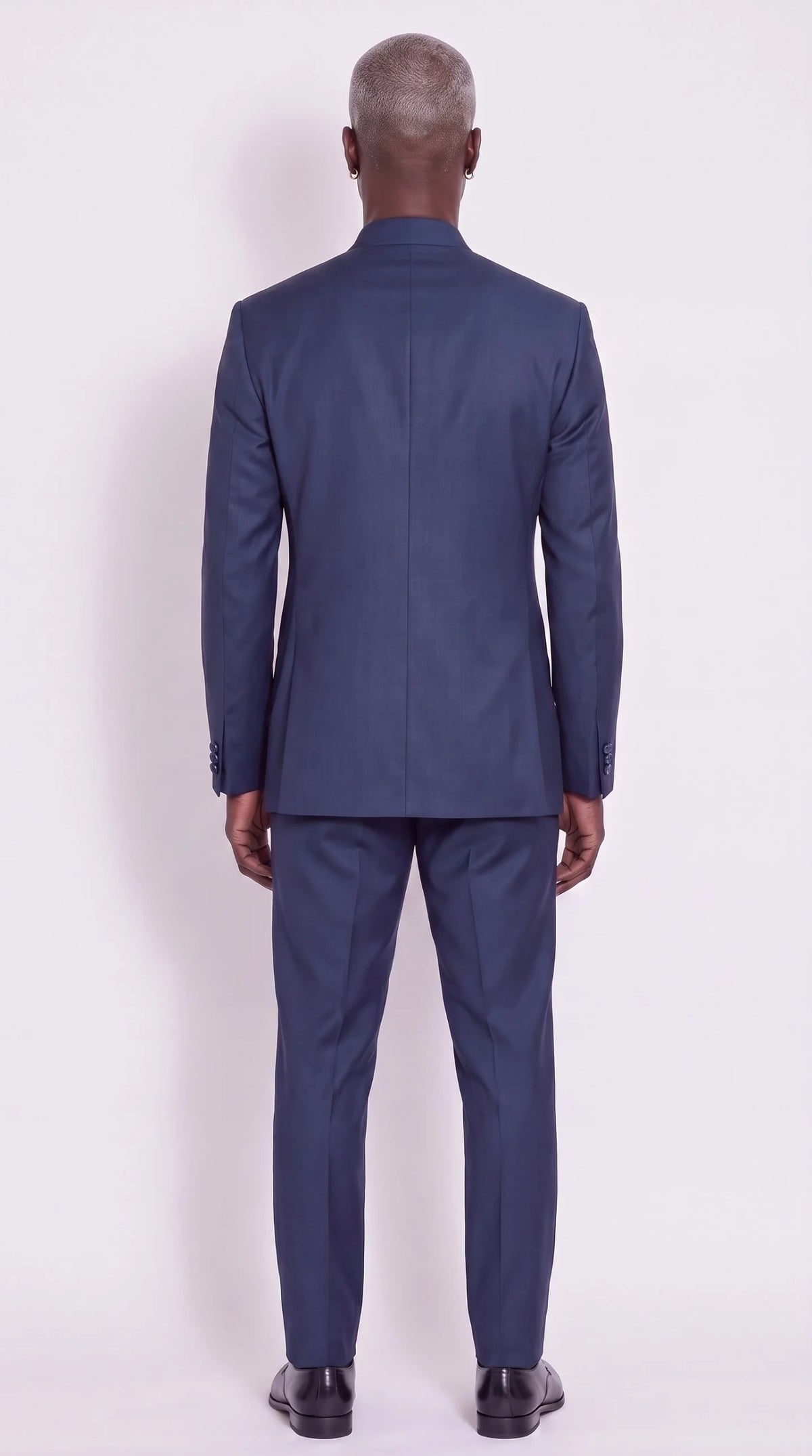 The Noir Adinkra Suit — Navy Embroidered Mandarin Suit — back view, Christopher Noir