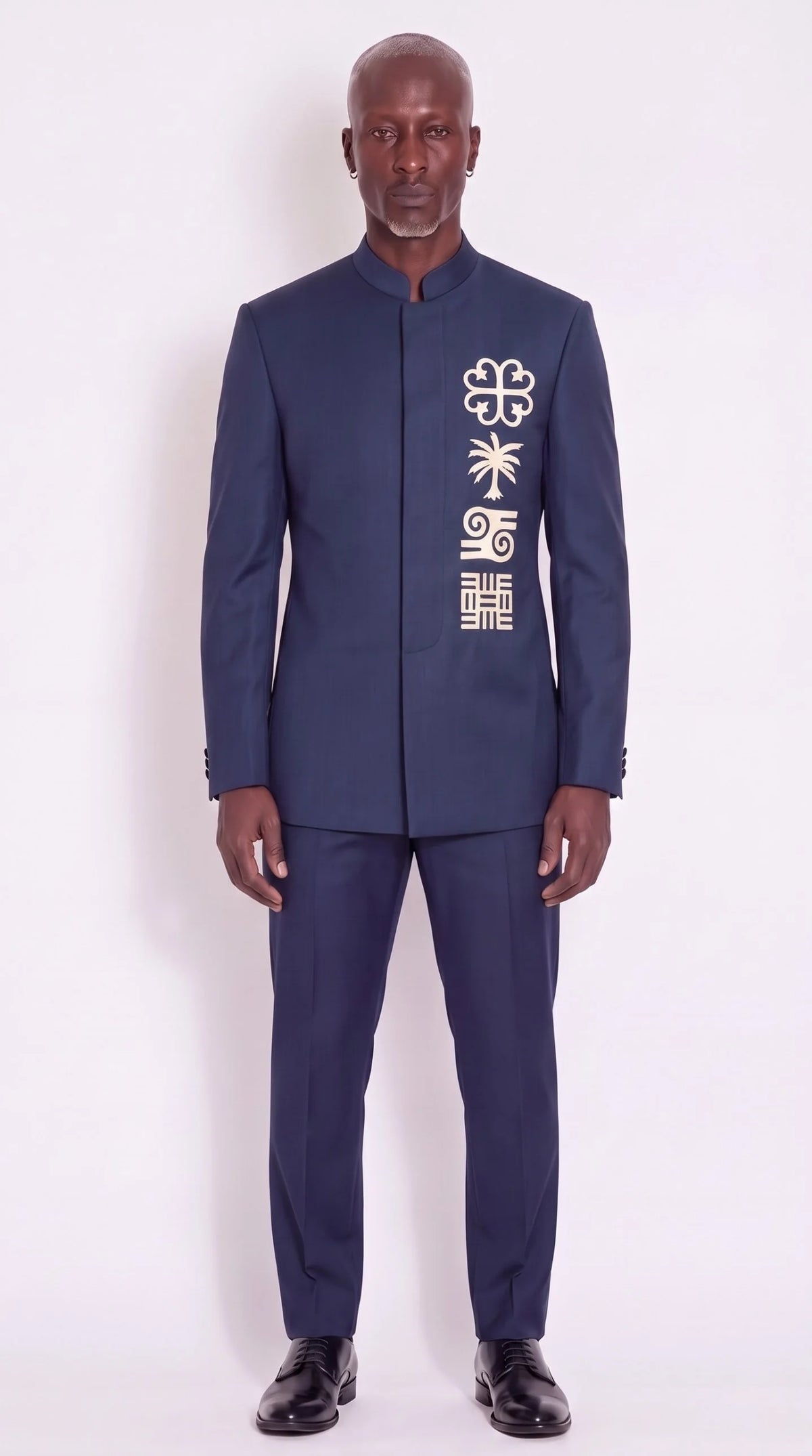 The Noir Adinkra Suit — Navy Embroidered Mandarin Suit — front view, mandarin collar and ivory embroidered symbols, Christopher Noir