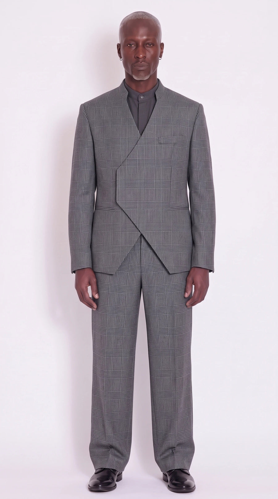 The Noir Blade Relaxed Suit — carbon grey glen plaid, front view, Christopher Noir