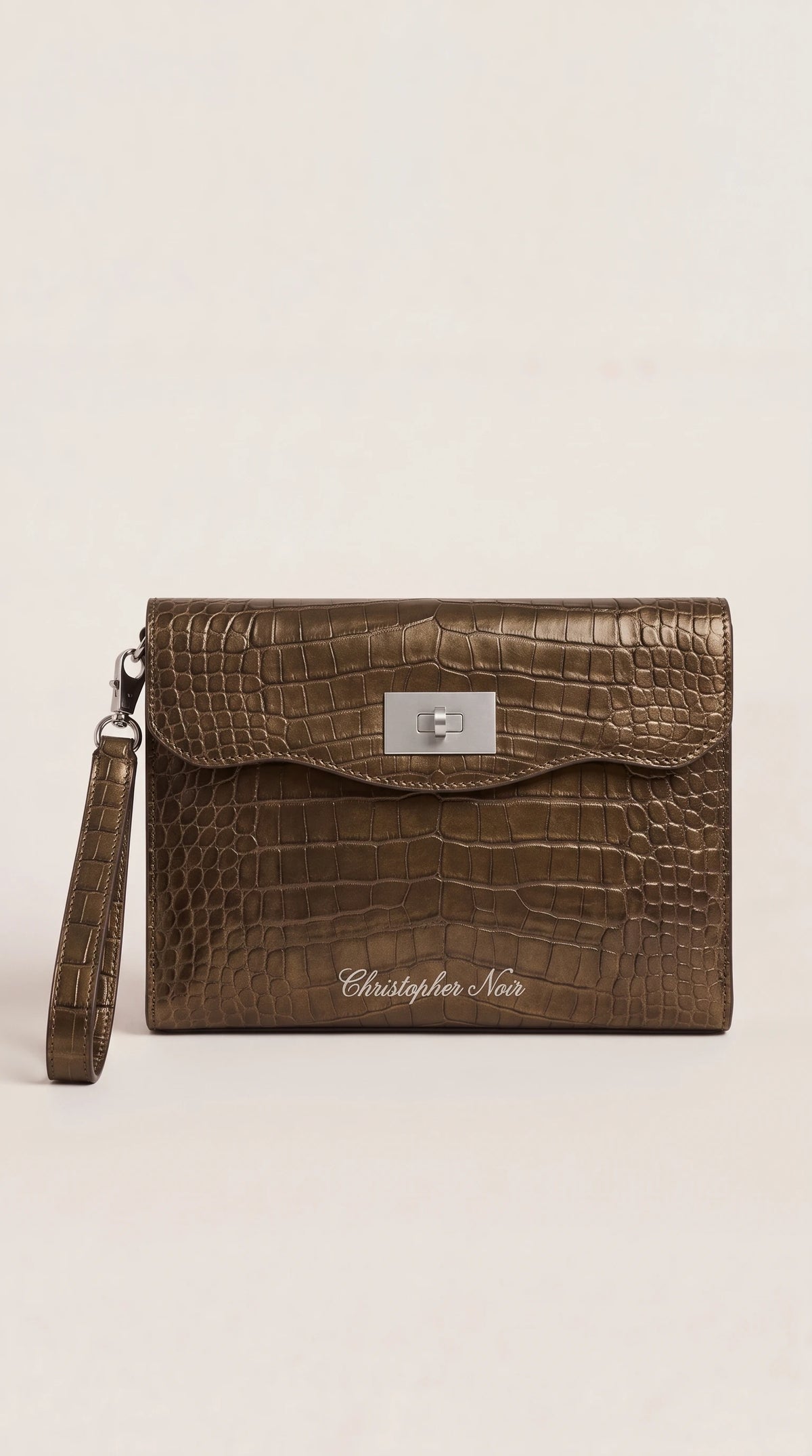 The Noir Bramber bronze croc-effect leather clutch, front view with scalloped flap and silver-tone turn-lock