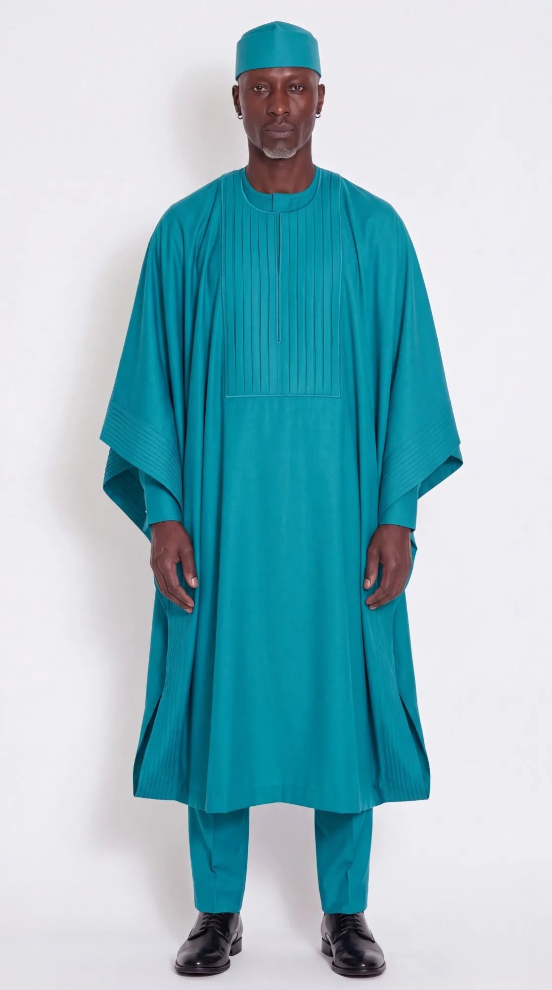 Noir Cascade Agbada — teal men's agbada set, worn on model