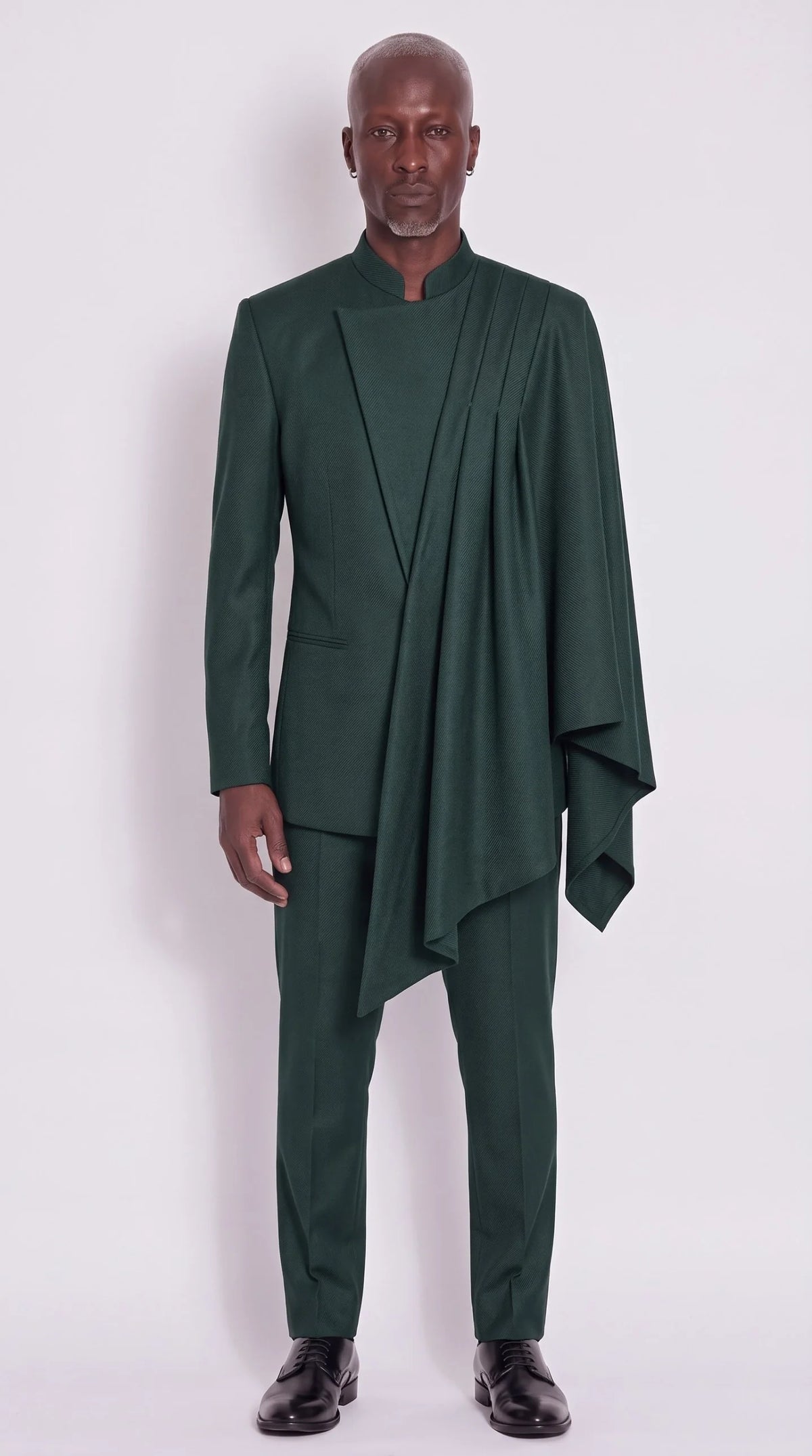 The Noir Cascade Suit — Forest Green Pleated-Drape Suit — front view, mandarin collar and pleated shoulder drape, Christopher Noir