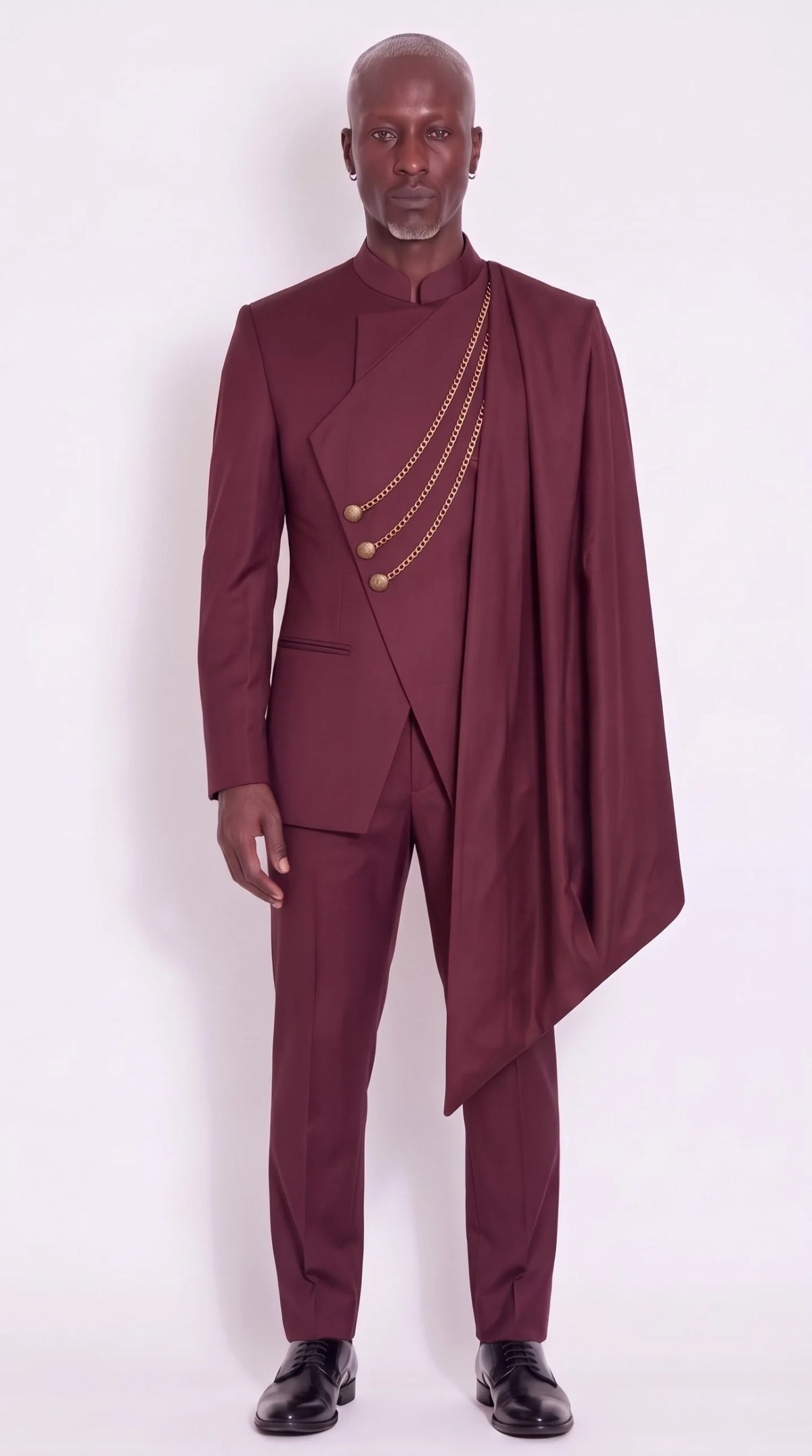 The Noir Chancellor Suit — Burgundy Chain-Drape Suit — front view, gold-tone chains and shoulder drape, Christopher Noir