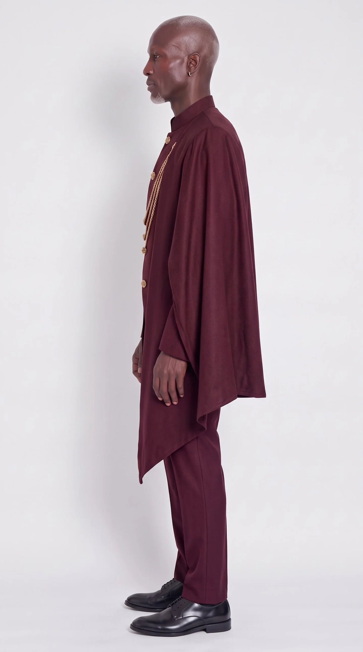 The Noir Chancellor Suit — Burgundy Chain-Drape Suit — side profile, Christopher Noir