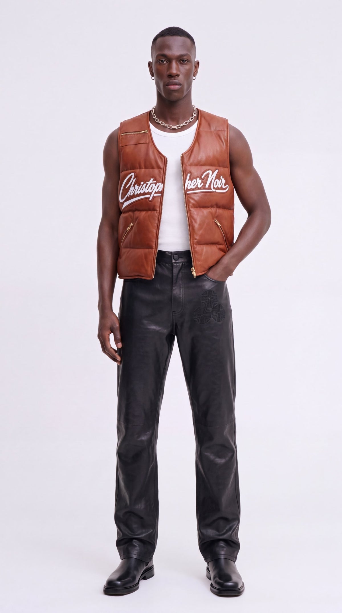 The Noir Colonsay cognac leather collarless signature puffer gilet by Christopher Noir