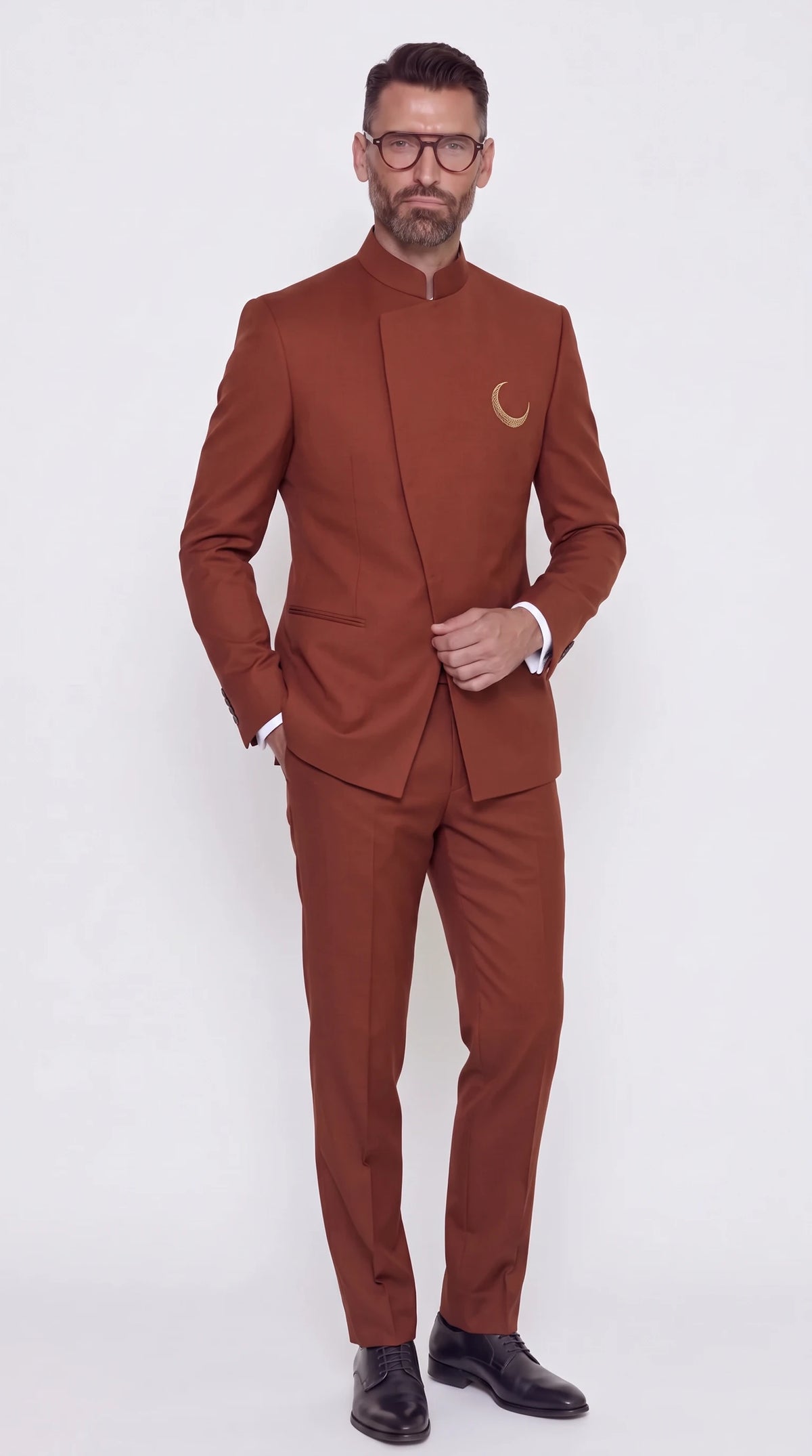 The Noir Crescent Motif Suit — Rust Embroidered Crossover Suit — front view, mandarin collar, crossover front and gold-tone embroidered crescent, Christopher Noir