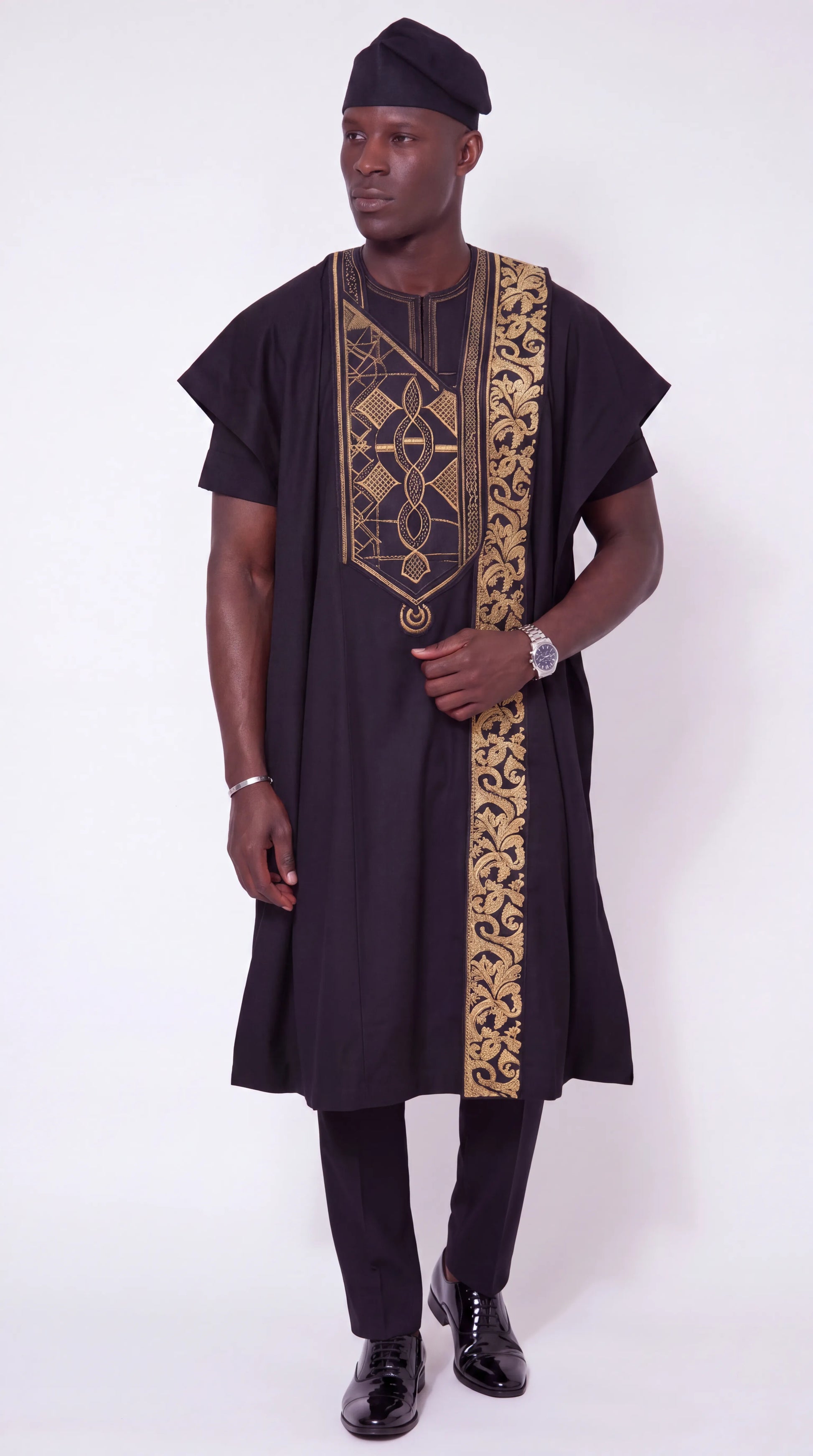 Noir Gilt Agbada — black men's agbada set with gold embroidered chest panel and side band, front view