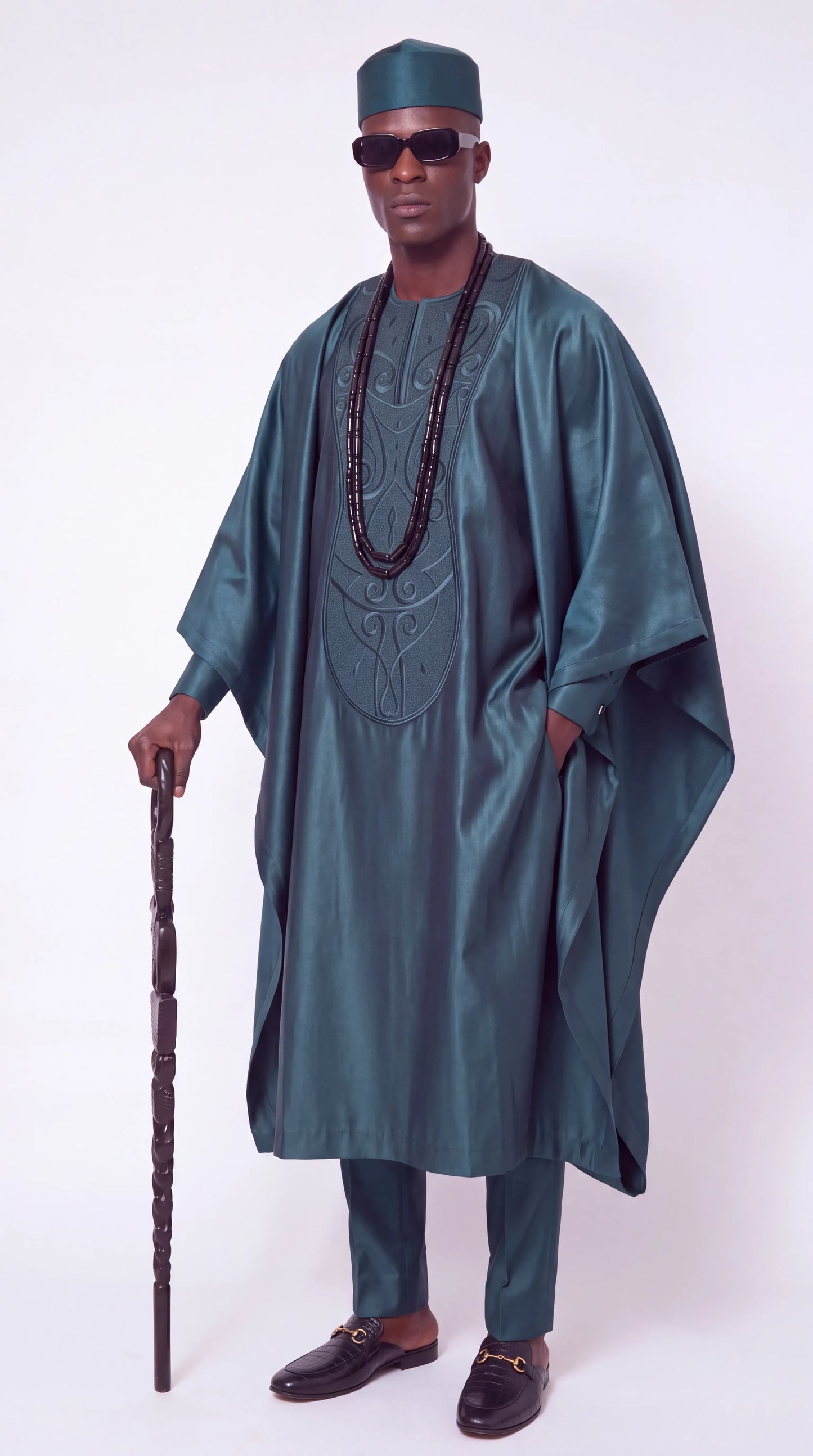 Noir Lagoon Agbada — teal agbada set, three-quarter view showing robe drape
