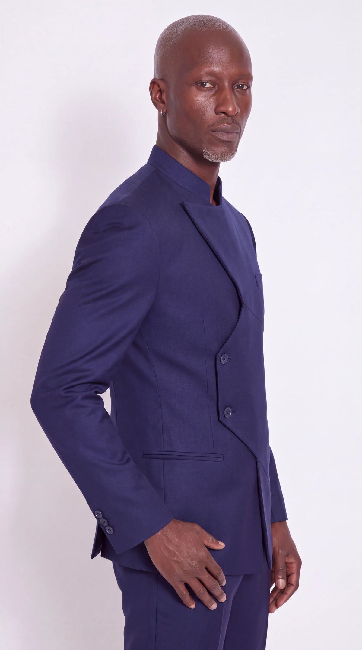 The Noir Meridian Suit — Navy Angular-Panel Suit — front panel and button detail