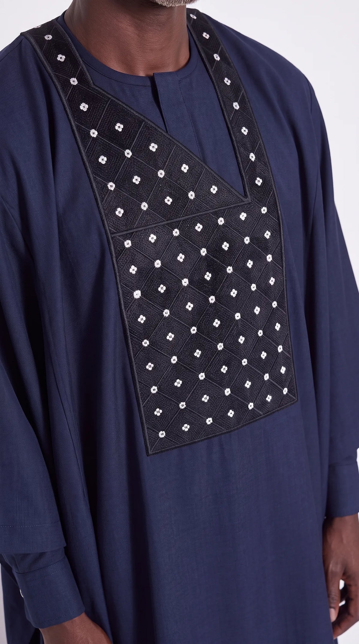 Noir Nocturne Agbada — midnight navy men's agbada set, close-up of the chest detail