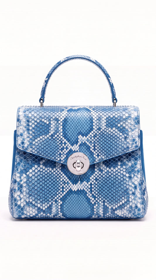 The Noir Period Azurine top-handle handbag in blue and white python-print leather, front view