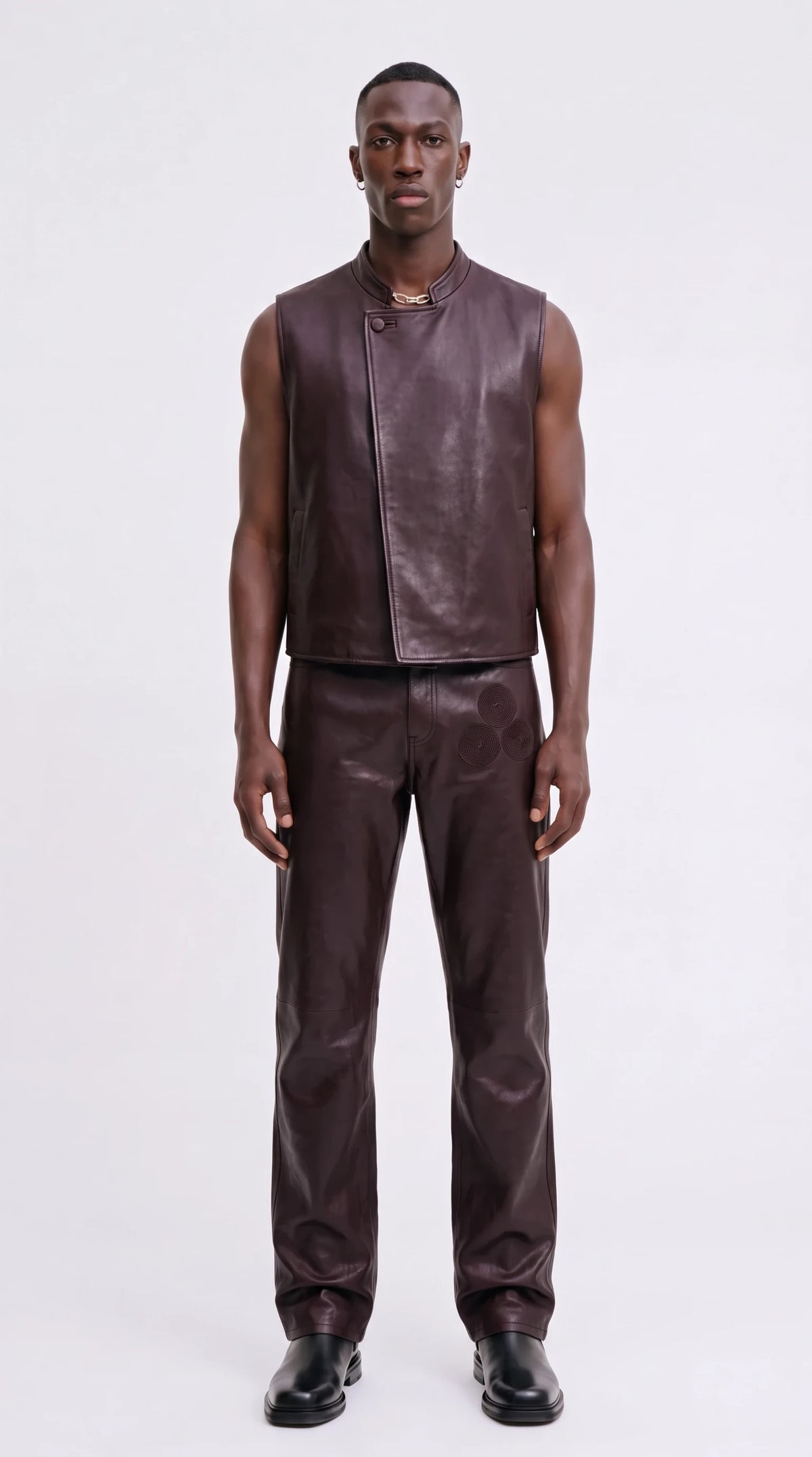 The Noir Rousay oxblood leather waistcoat with stand collar and asymmetric overlapping front