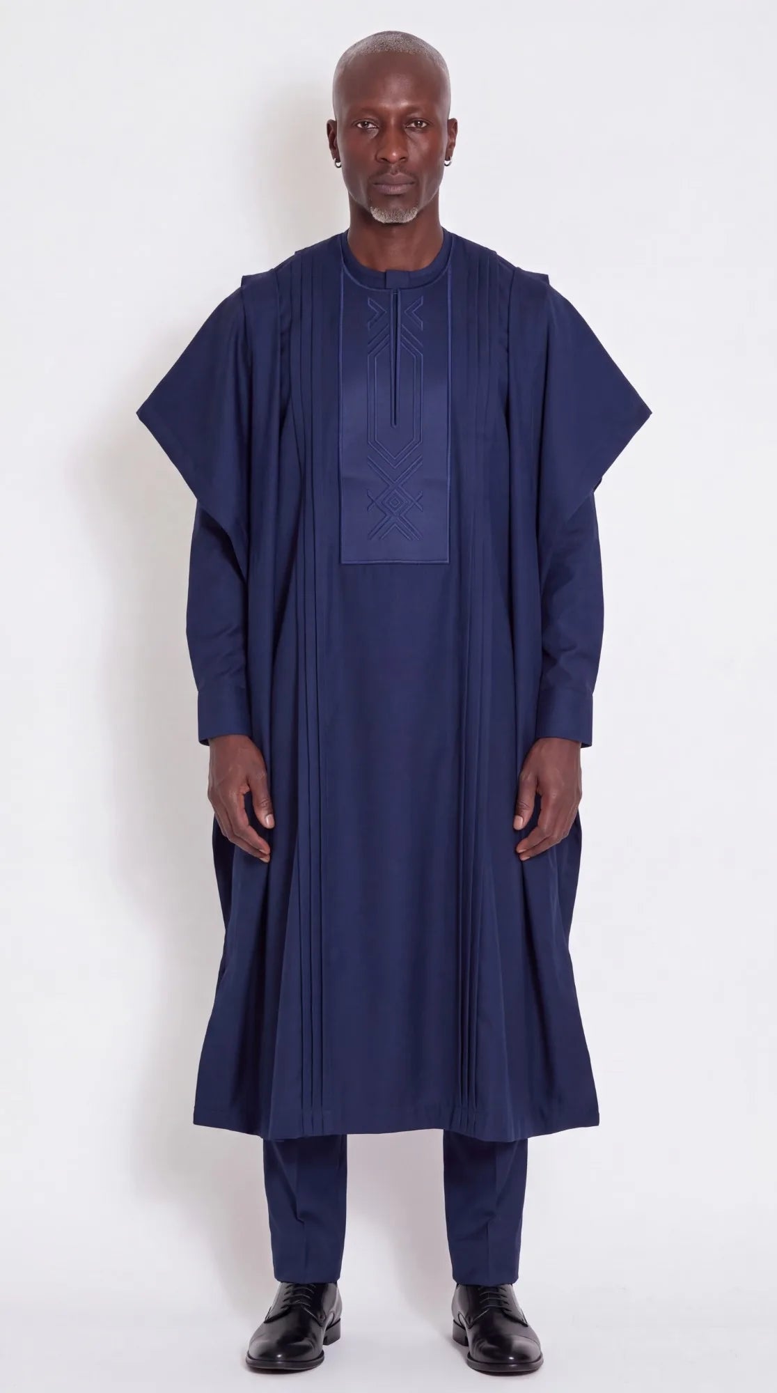 Noir Sovereign Agbada — navy men's agbada set, worn on model