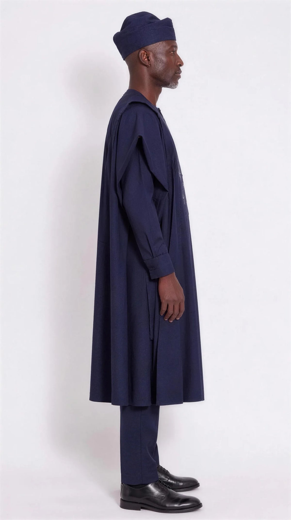 Noir Stellar Agbada — midnight navy men's agbada set, side view showing the robe drape