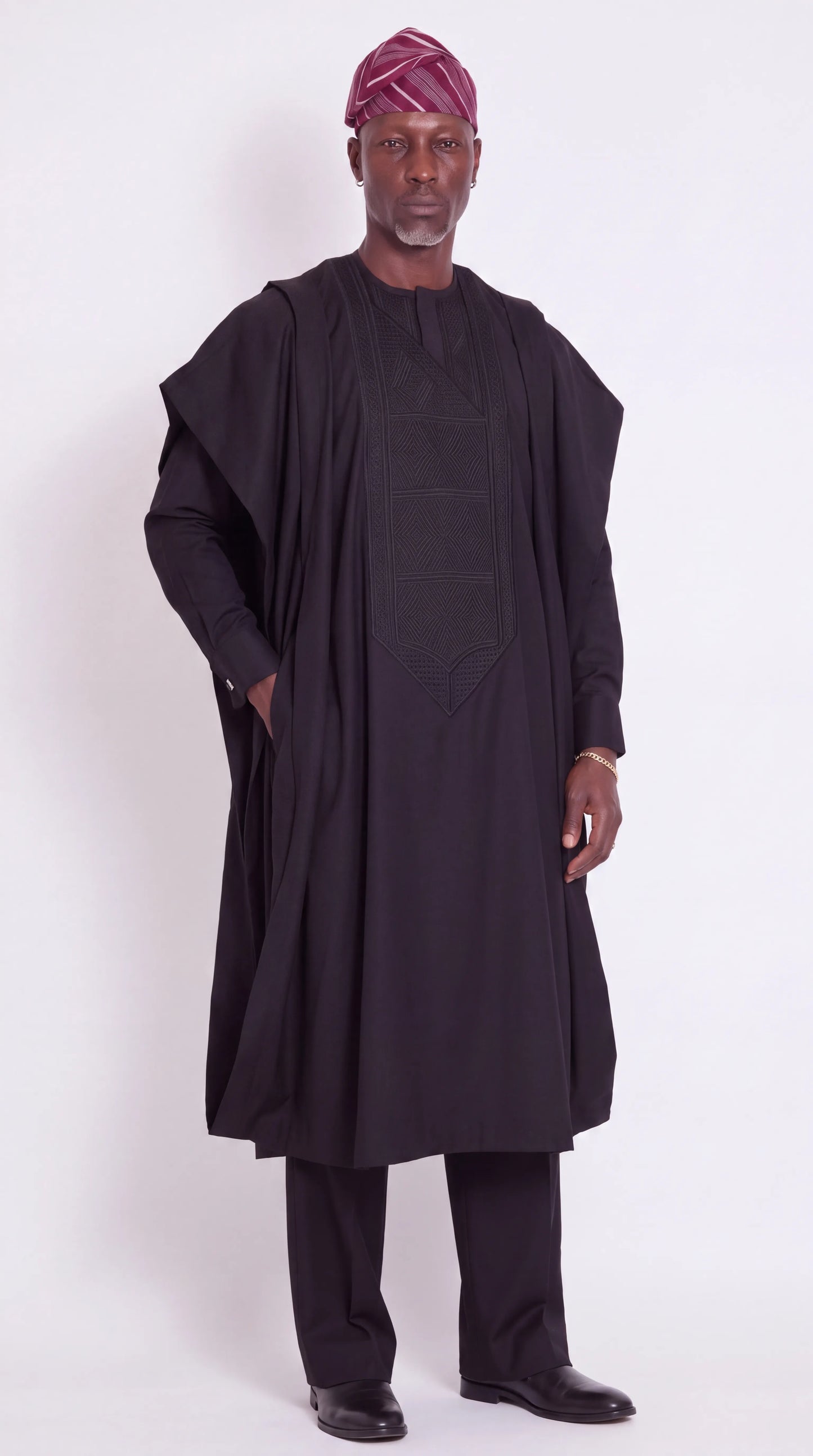 Noir Umbra Agbada — black men's agbada set with tonal geometric embroidered chest panel, front view