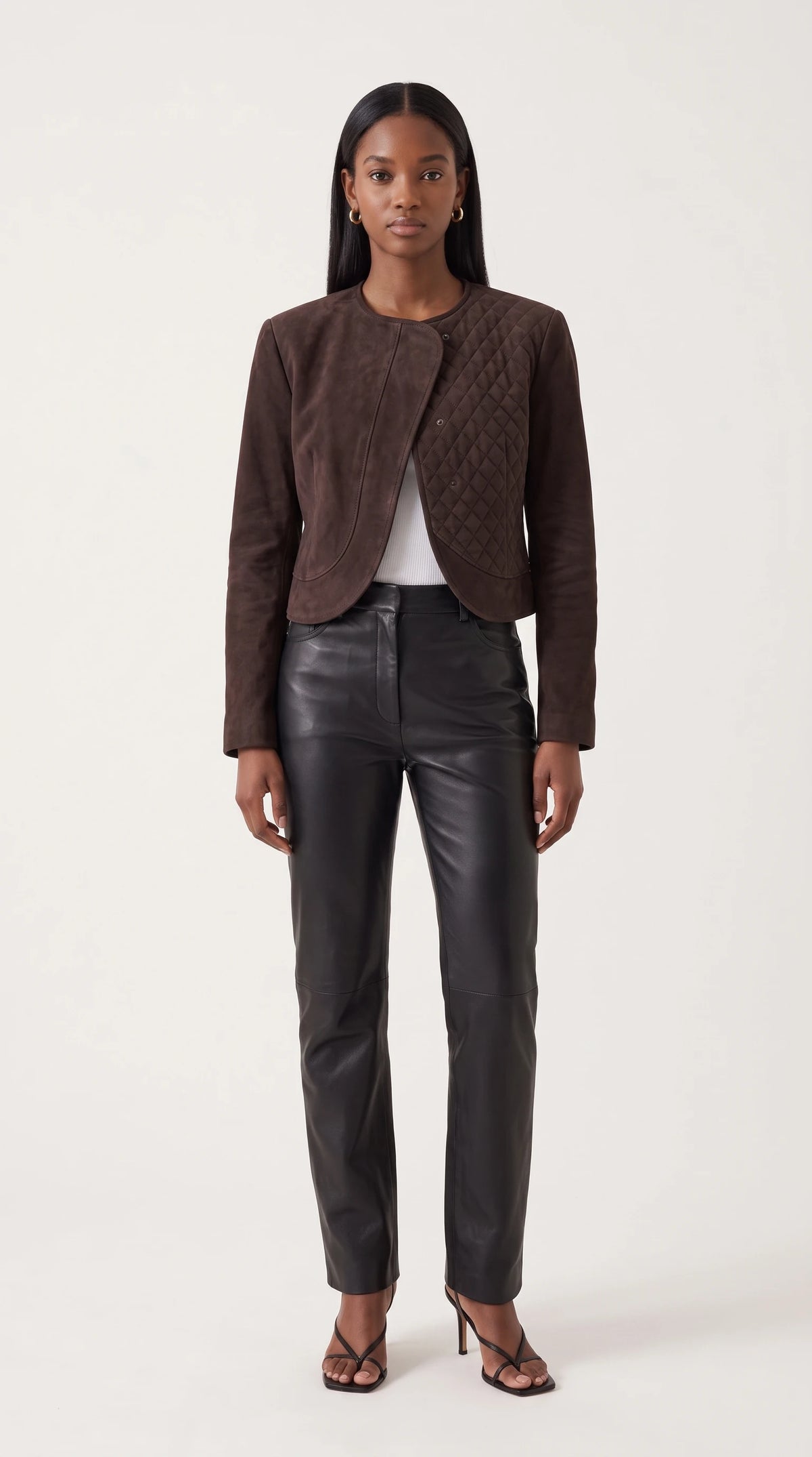 The Noir Vaila collarless espresso suede jacket with asymmetric front and diamond-quilted panel