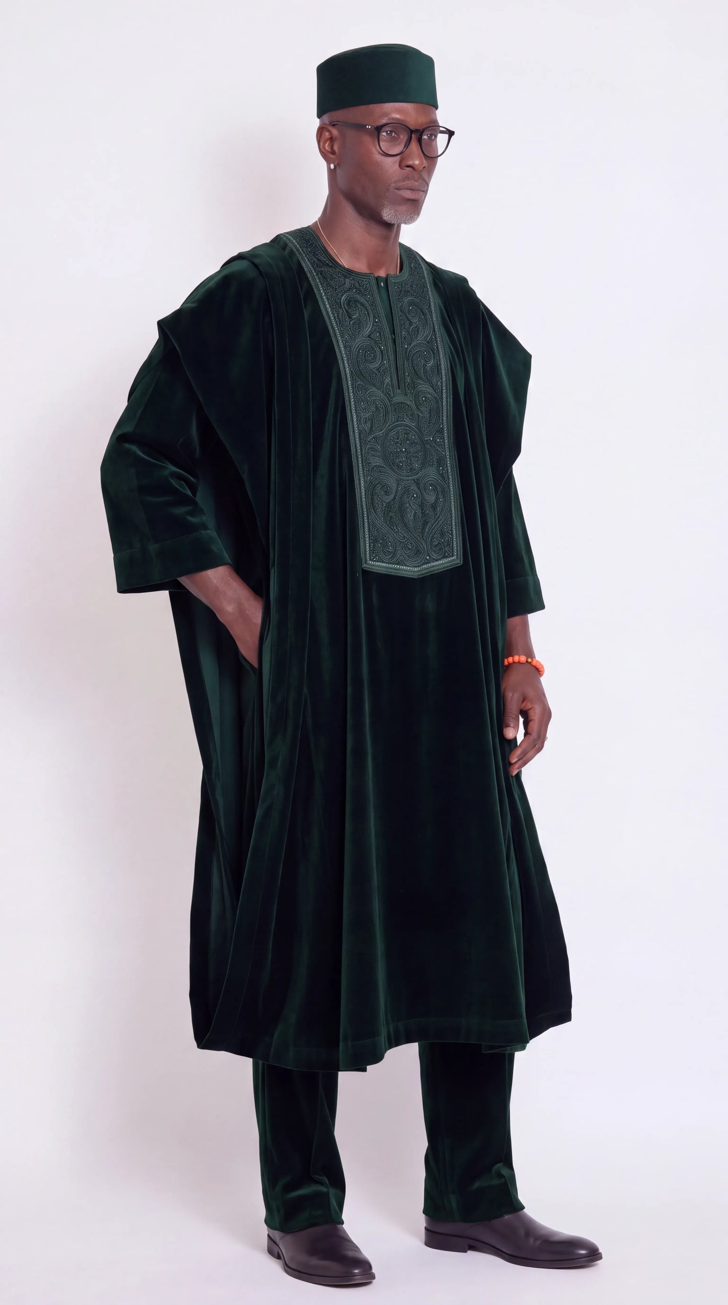 Noir Verdure Agbada — emerald green agbada set, three-quarter view showing robe drape