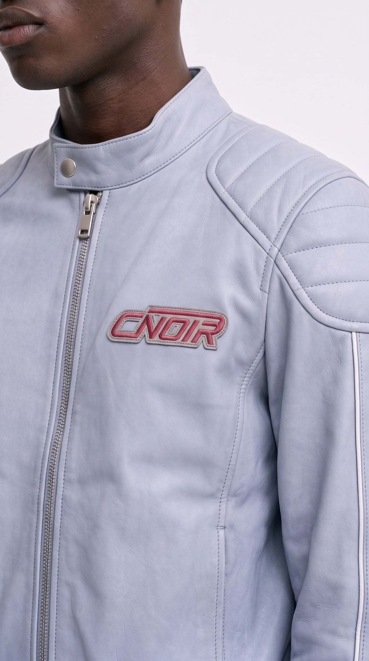 The Noir Powder Blue Racer — Padded Racer Jacket (Unisex) – detail close-up, Christopher Noir