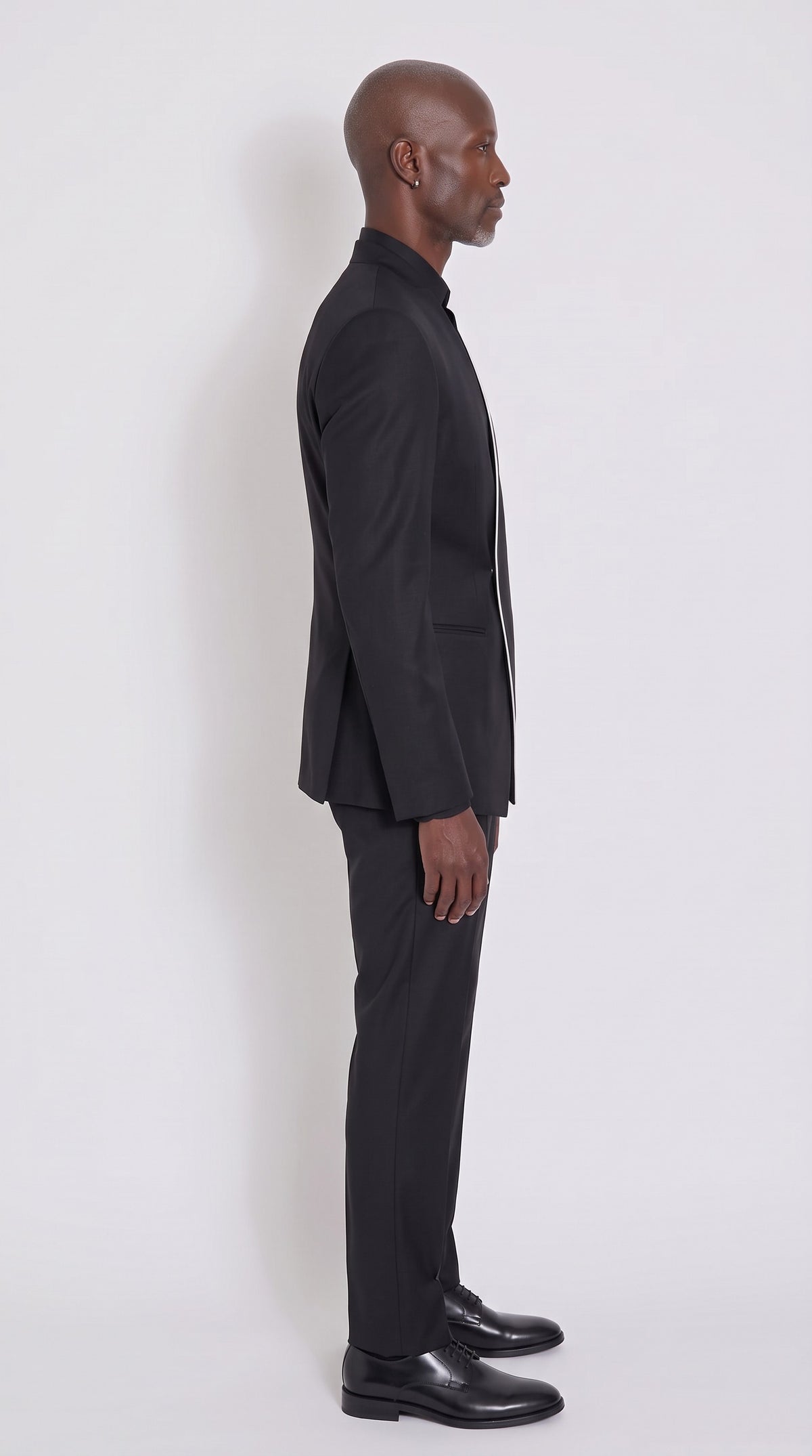The Noir Blade Suit — Collarless Diagonal Suit – side profile view, Christopher Noir