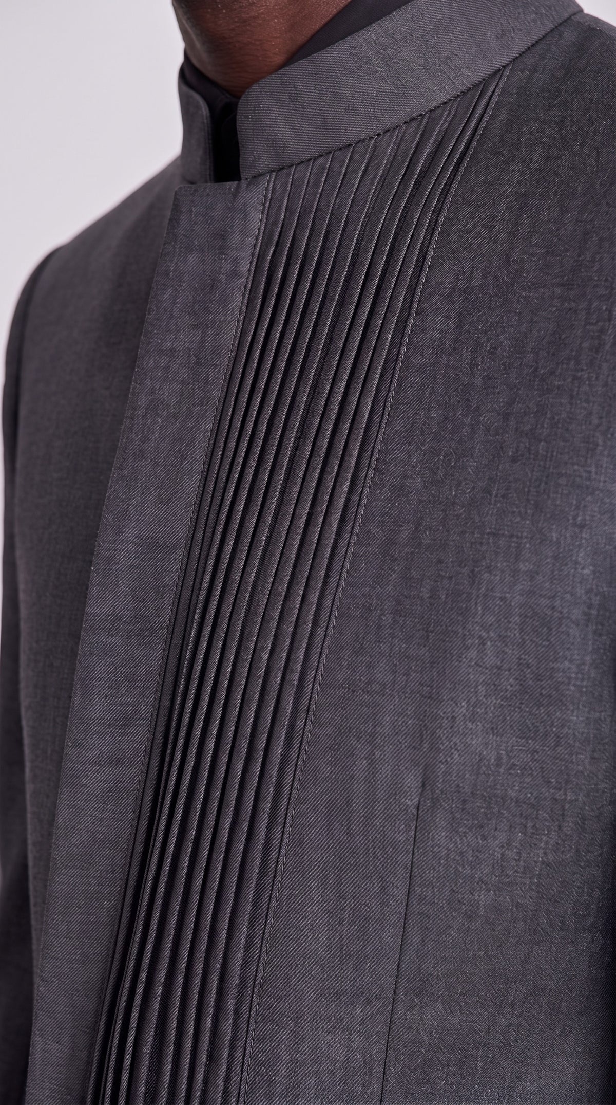 The Noir Cadence Suit — Knife-Pleat Mandarin Suit – fabric and tailoring detail close-up, Christopher Noir
