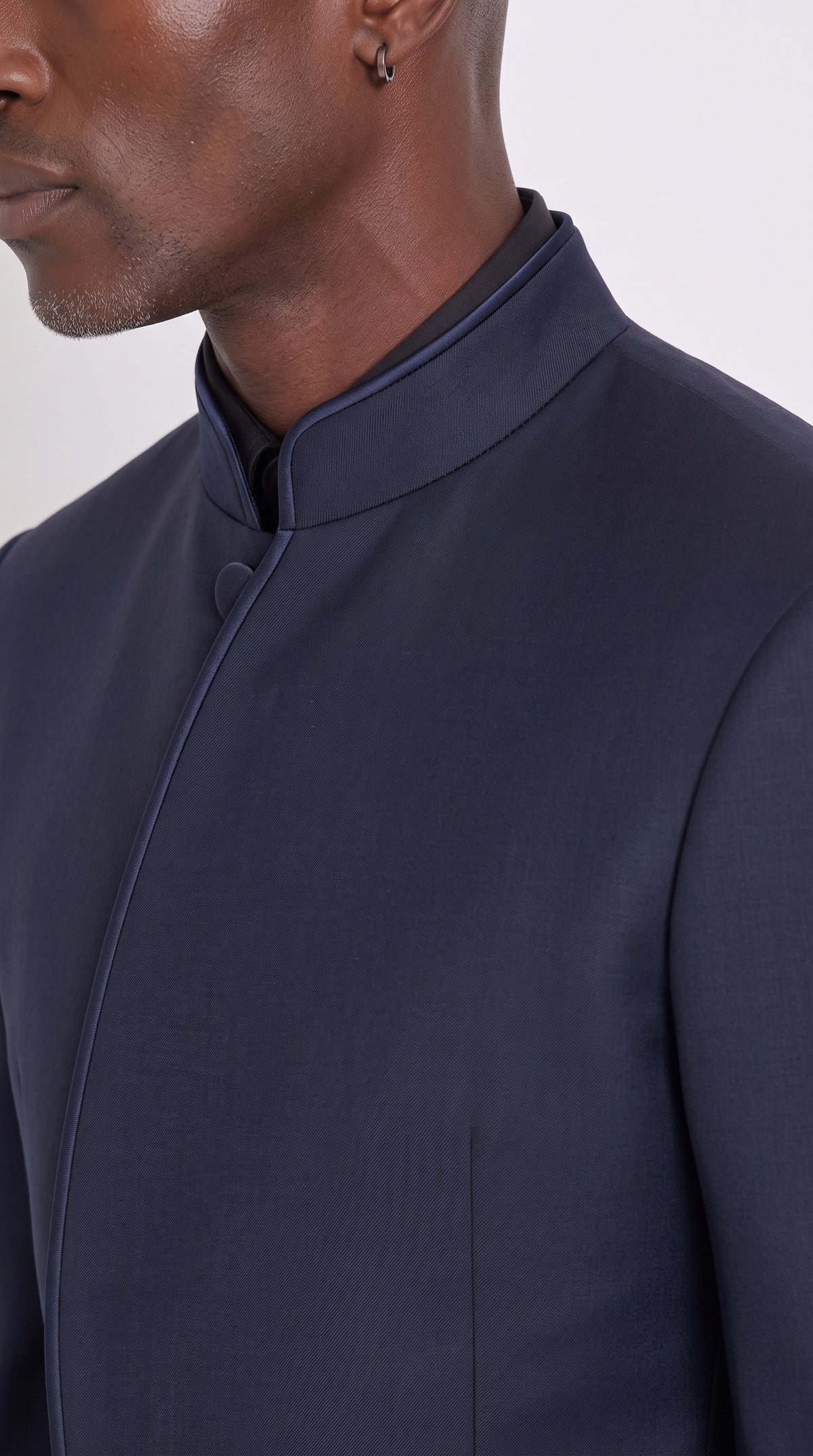 The Noir Crescent Suit — Curved Wrap-Front Mandarin Suit – fabric and tailoring detail close-up, Christopher Noir