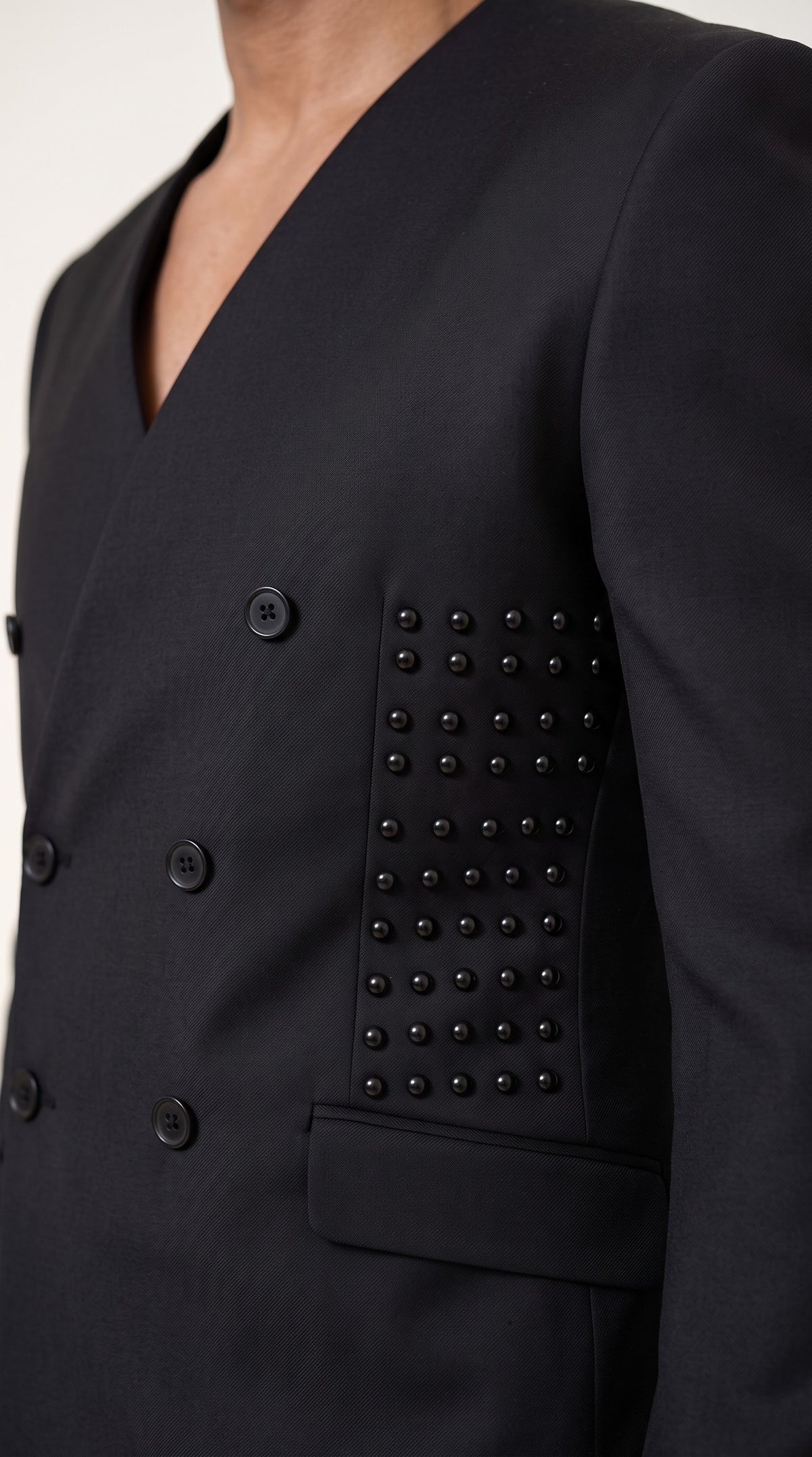 The Noir Eclipse Suit — Collarless V-Neck Suit – fabric and tailoring detail close-up, Christopher Noir
