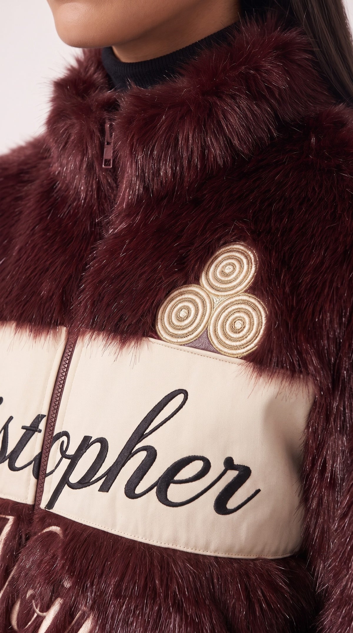 The Noir Eriskay — Burgundy Faux-Fur Signature Bomber Jacket – detail close-up, Christopher Noir