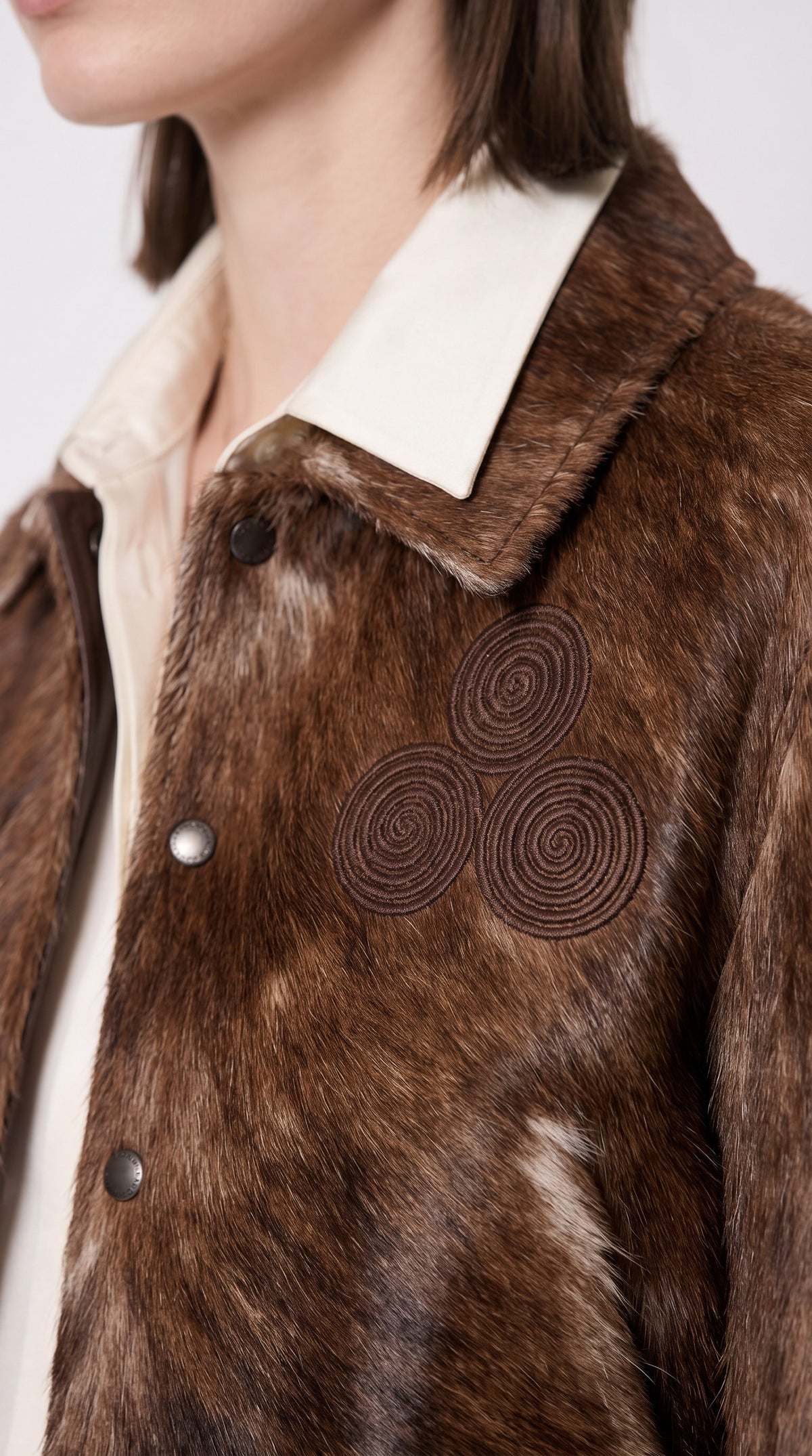 The Noir Lismore — Cognac Hair-On Calf Bomber Jacket – detail close-up, Christopher Noir