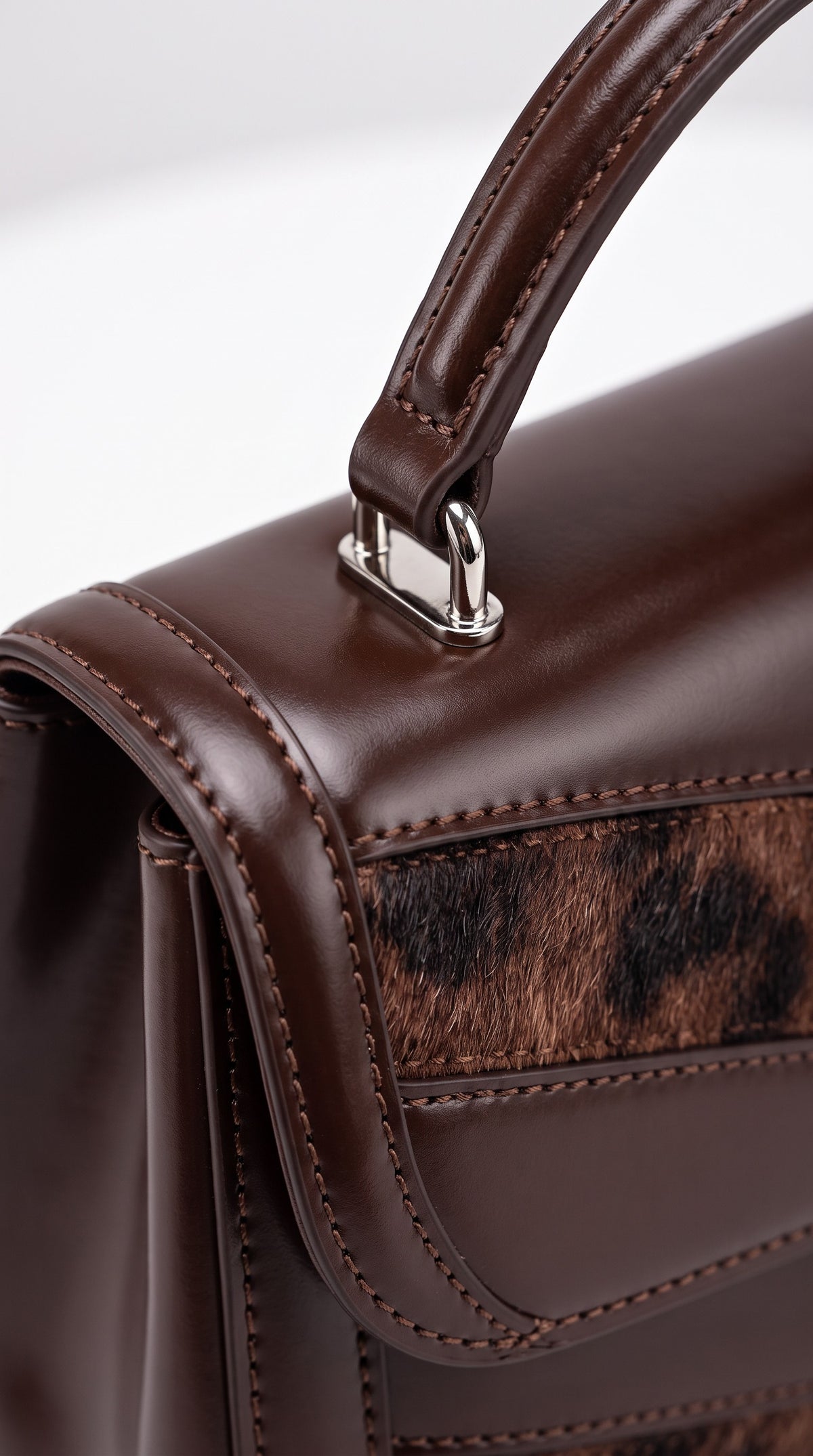 The Noir Ludlow — Leopard Chevron Top-Handle Handbag – detail close-up, Christopher Noir