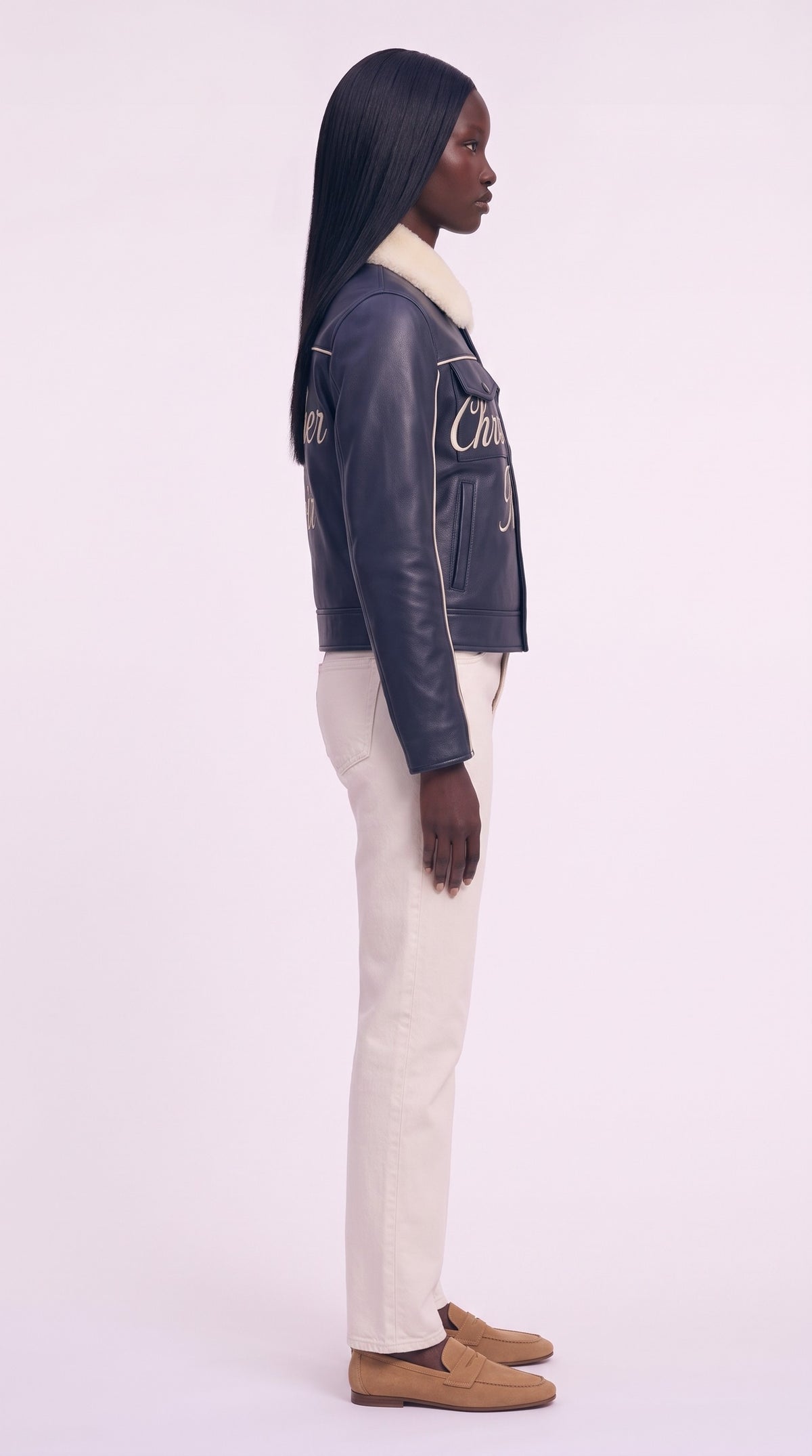 The Noir Luing — Navy Leather Shearling-Collar Signature Trucker Jacket – side profile, Christopher Noir