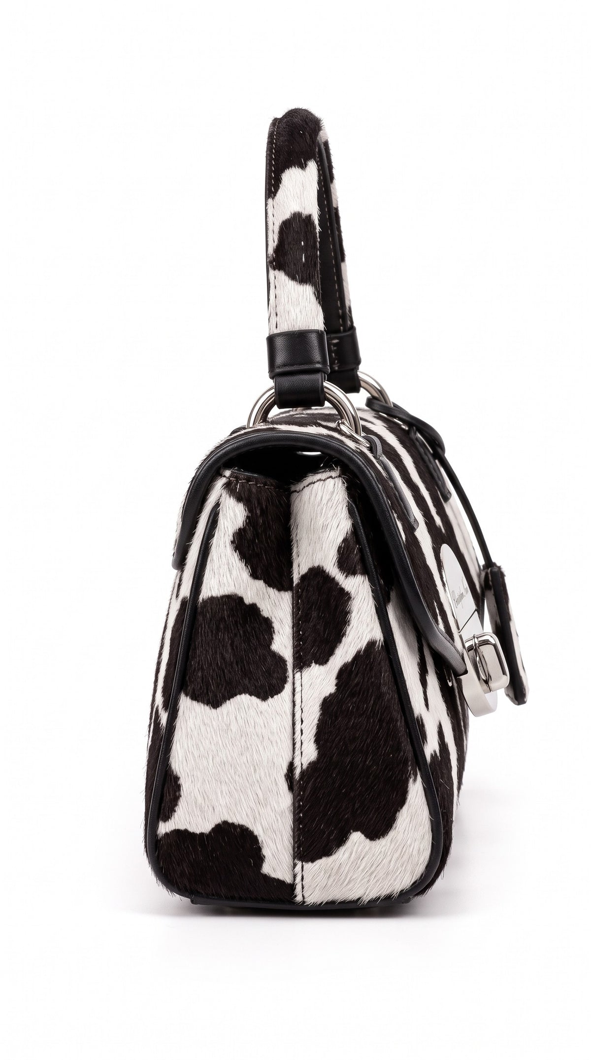 The Noir Malvern — Cow Print Top-Handle Handbag – side profile, Christopher Noir