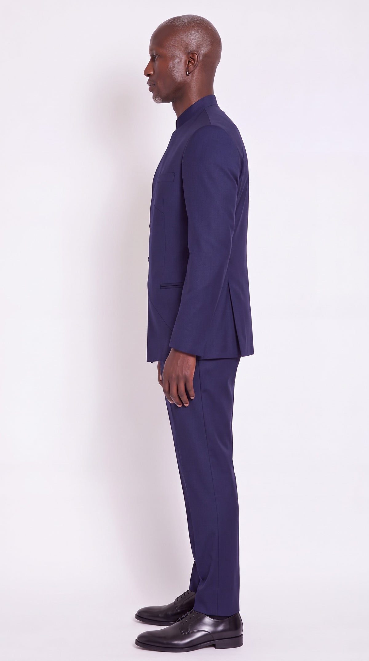 The Noir Meridian Suit — Navy Angular-Panel Suit – side profile view, Christopher Noir