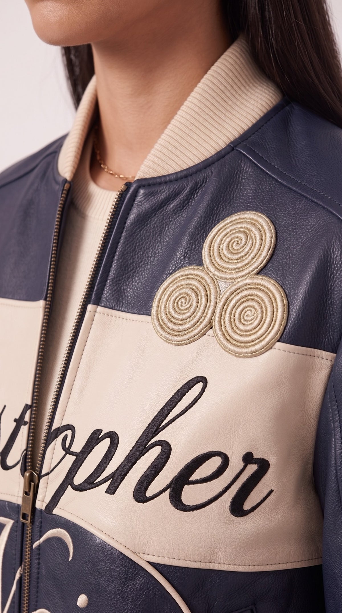 The Noir Rum — Navy Leather Signature Varsity Jacket – detail close-up, Christopher Noir