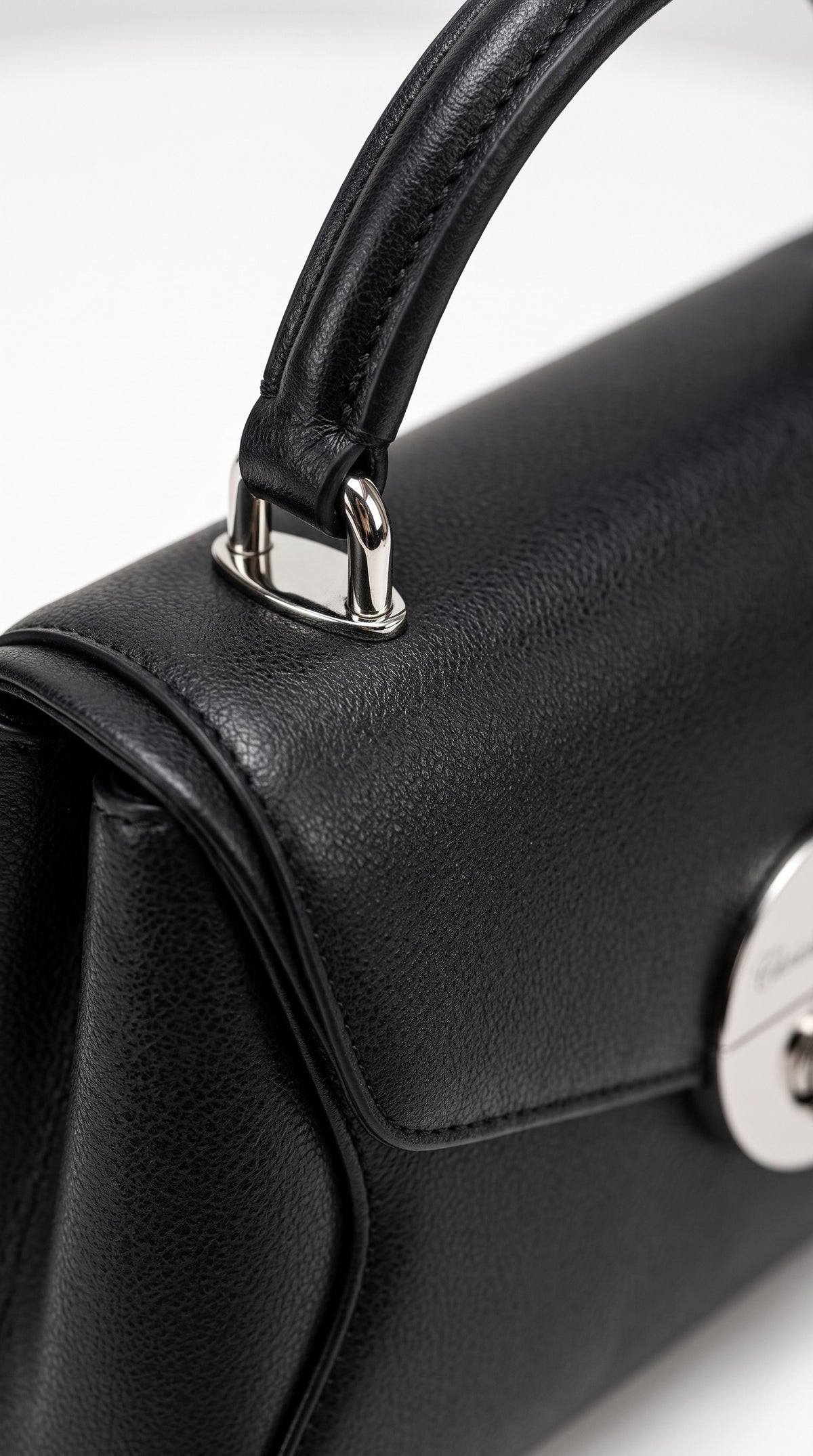 The Noir Selborne — Black Envelope Top-Handle Handbag – detail close-up, Christopher Noir