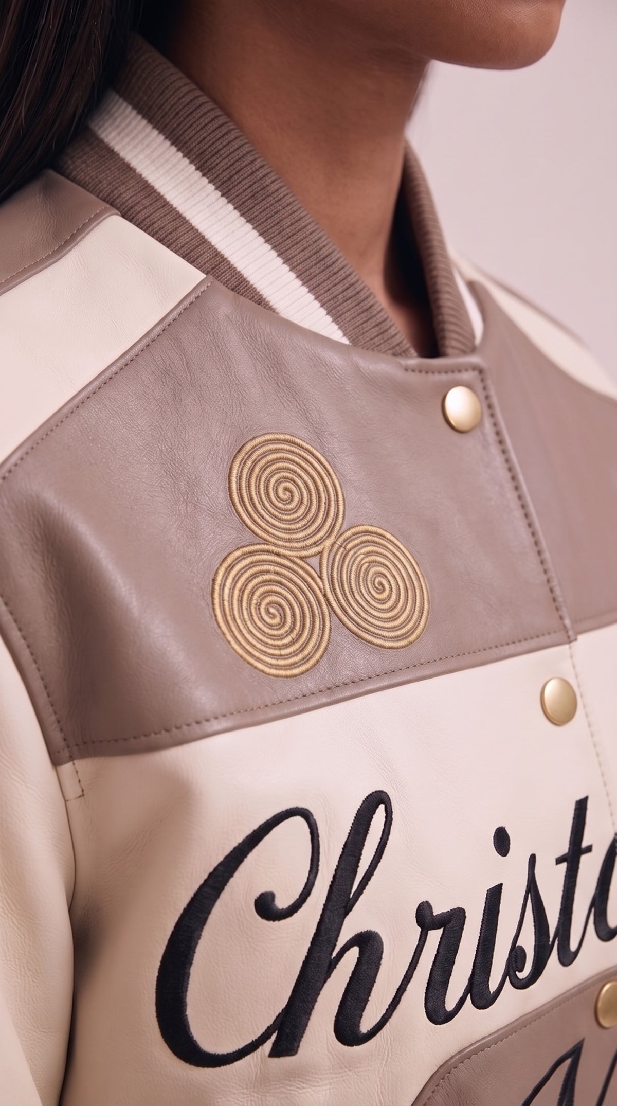 The Noir Shuna — Taupe & Cream Leather Signature Varsity Jacket – detail close-up, Christopher Noir
